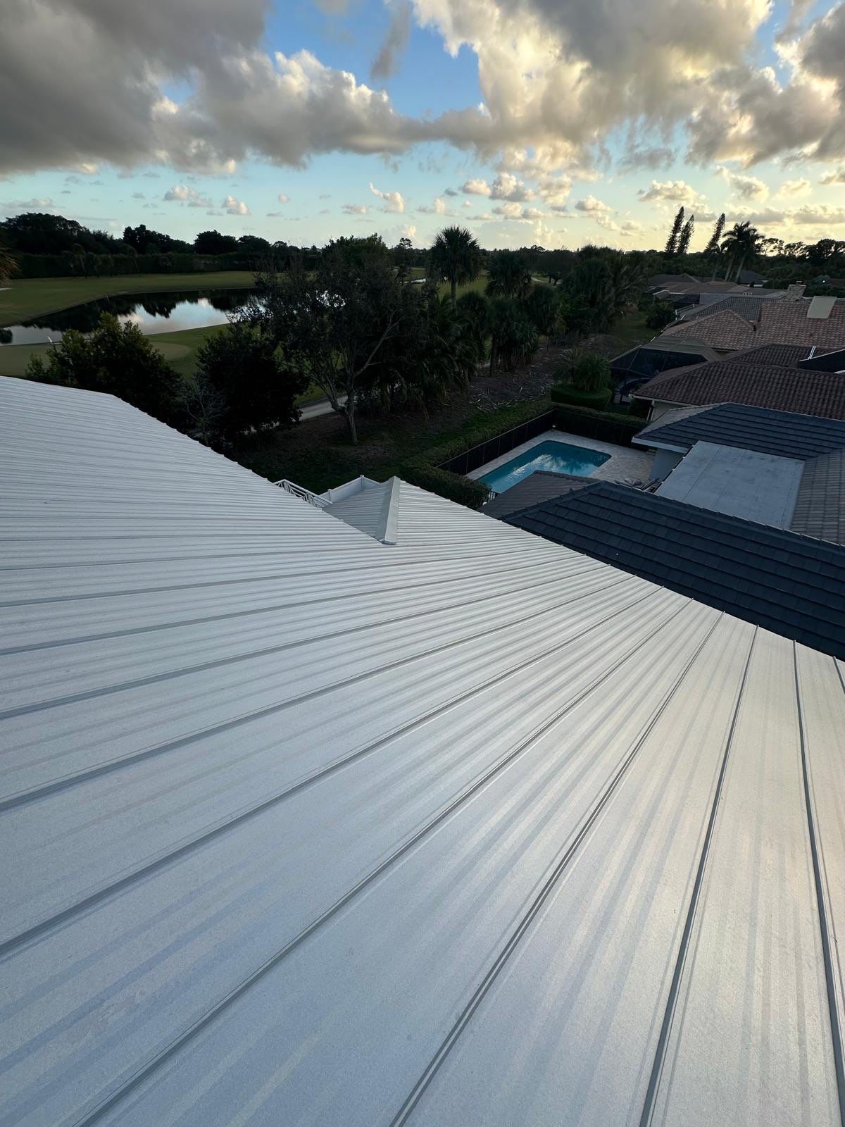 Residential Roofing Installation using 1" Nail strip metal roof by BLUES BROTHERS CONSTRUCTION CORP