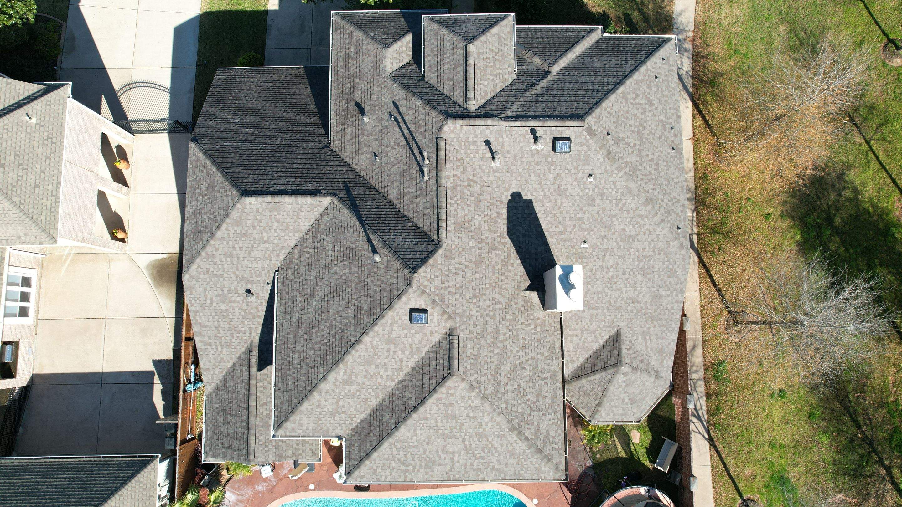 Two-Story Roof Replacement & Chimney Stucco Repair — Houston, TX by PL Roofing & SB Roofing, LLC.