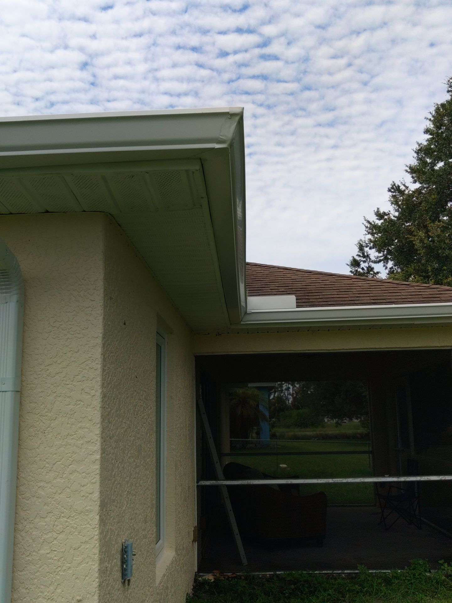 Seamless gutters in Lehigh Acres, FL provide a strong and efficient solution for managing heavy Florida rainfall by Gutter Professors