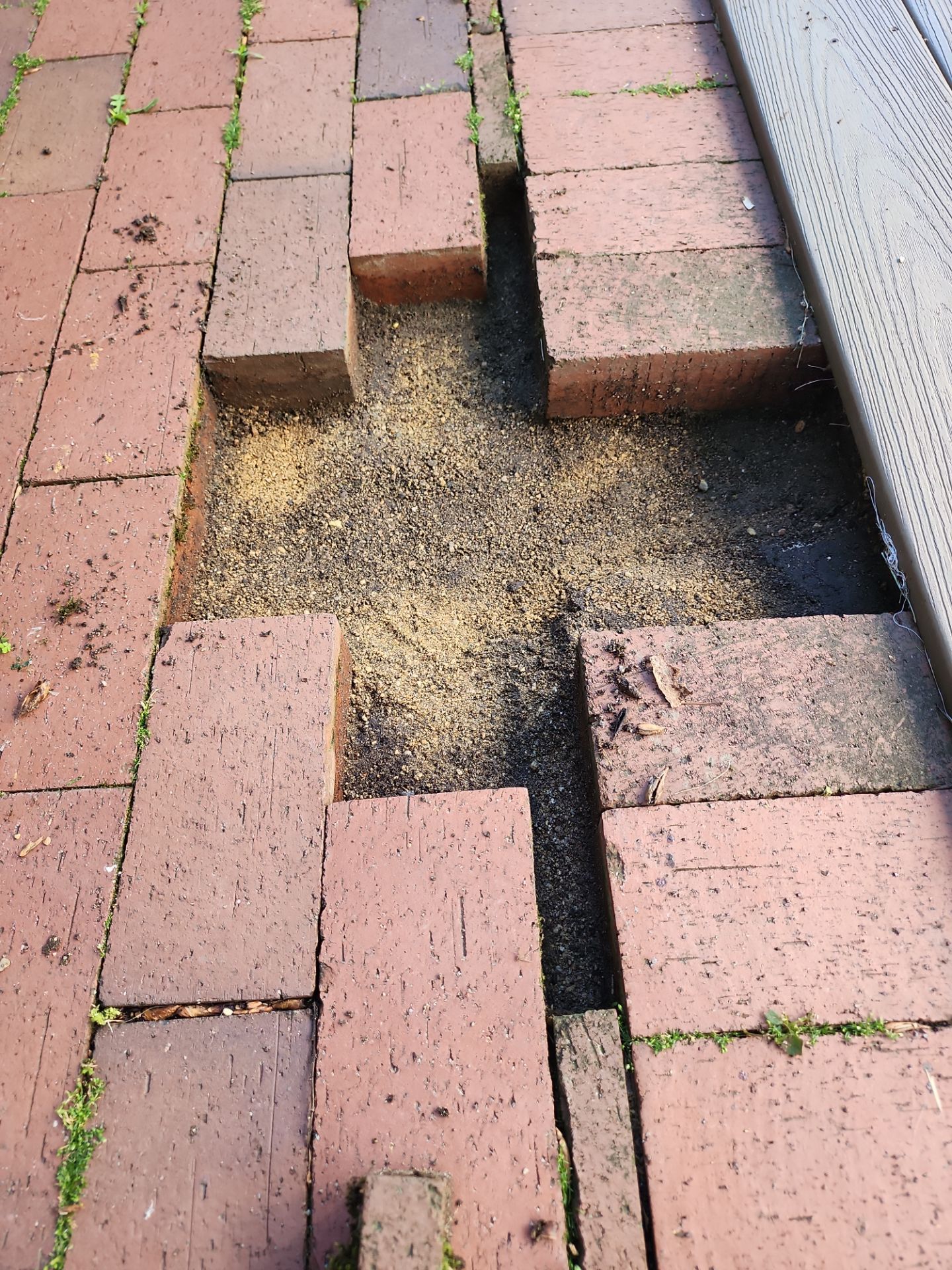 Brick paver repair, cleaning and sealing by Northern Power Washing LLC.
