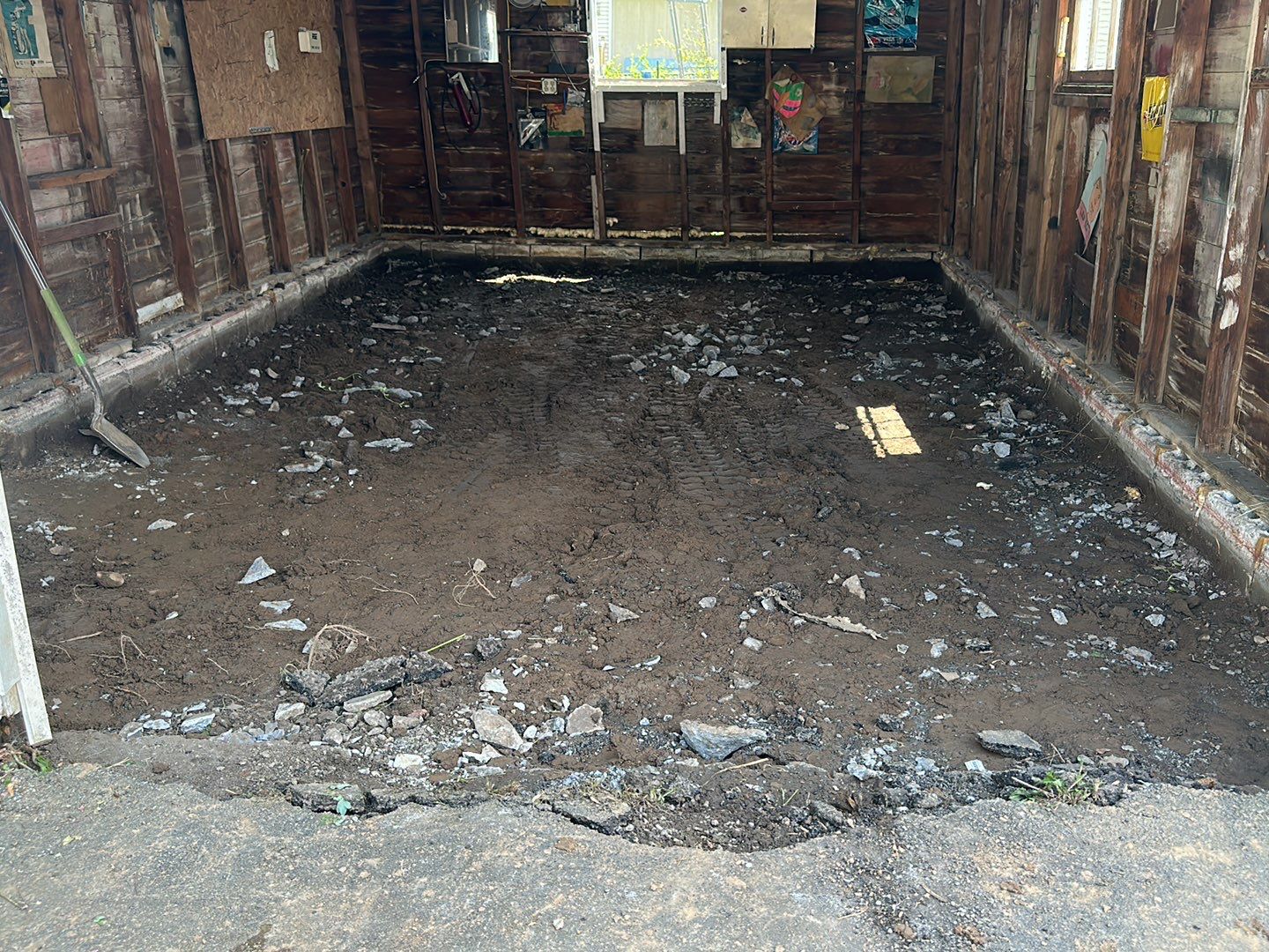 Broom finished patio and garage floor replacement  by NG Masonry & Construction LLC