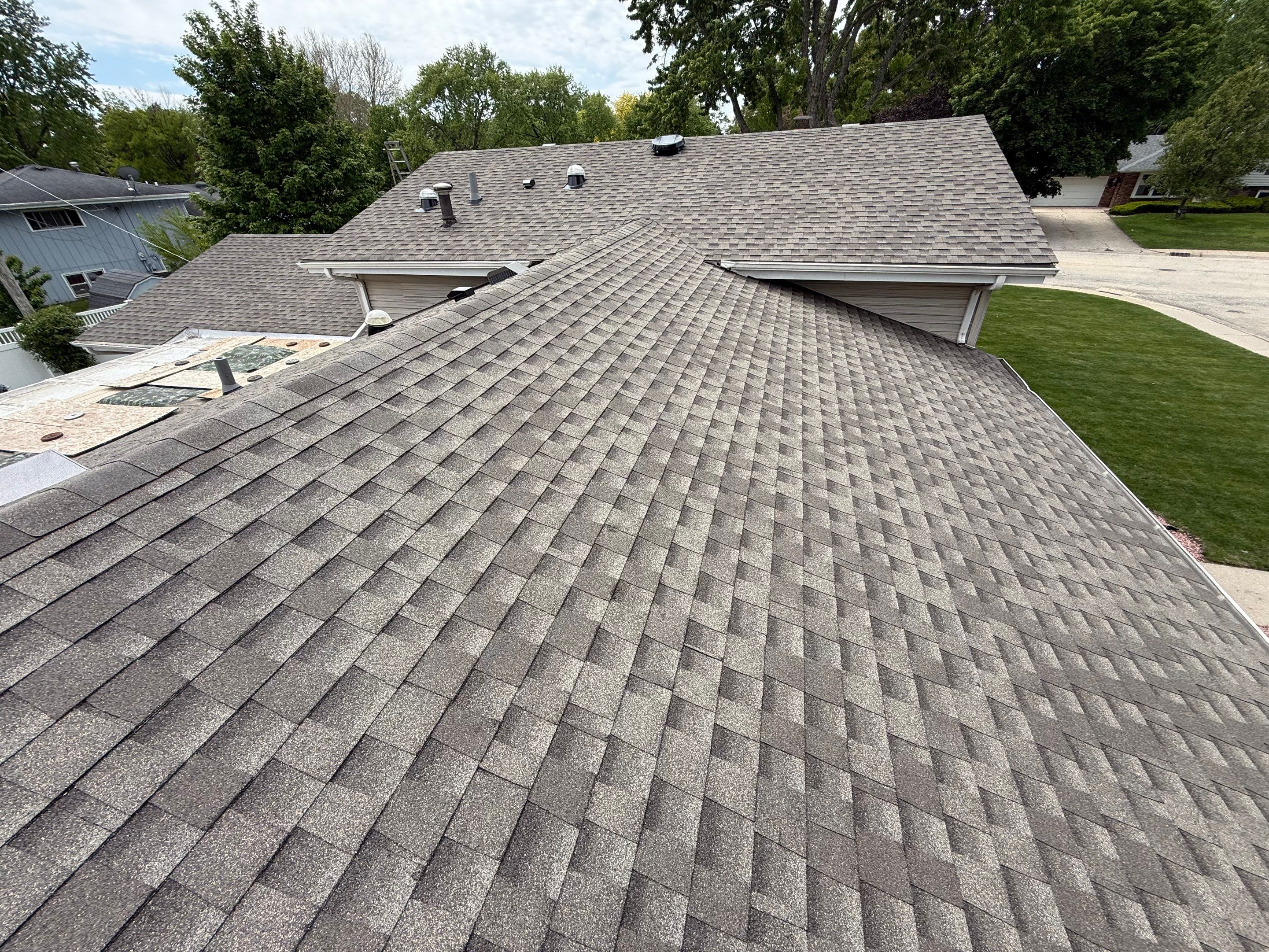 Roof, gutters, windows & siding replacement by Optimal Home Improvement 