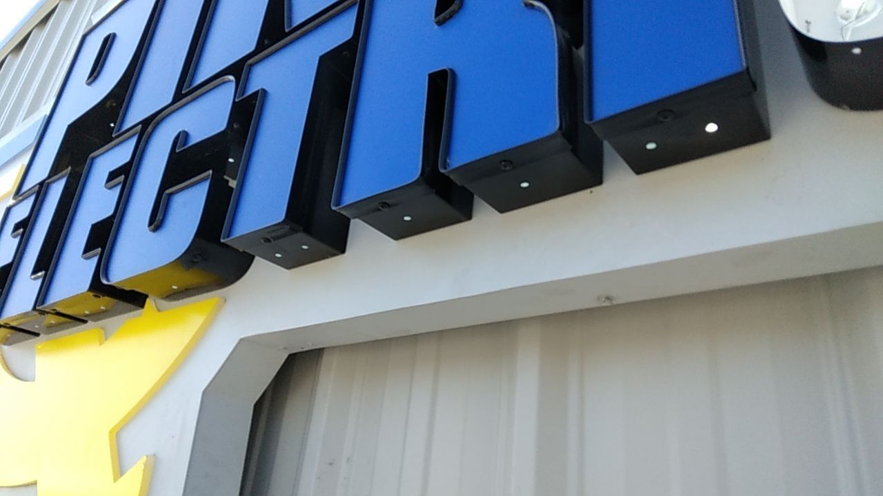 Channel Letters on Backer for Pike's Electric by SignCrafters