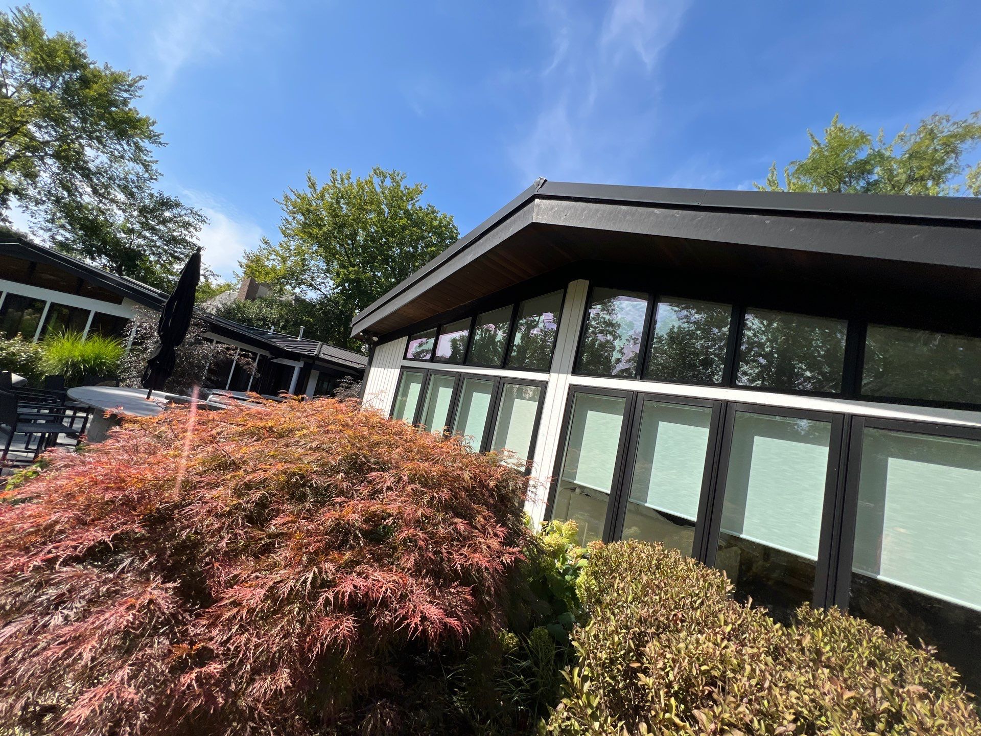 Complete Exterior House, Bluestone & Garage Floor Cleaning by Northern Power Washing LLC.