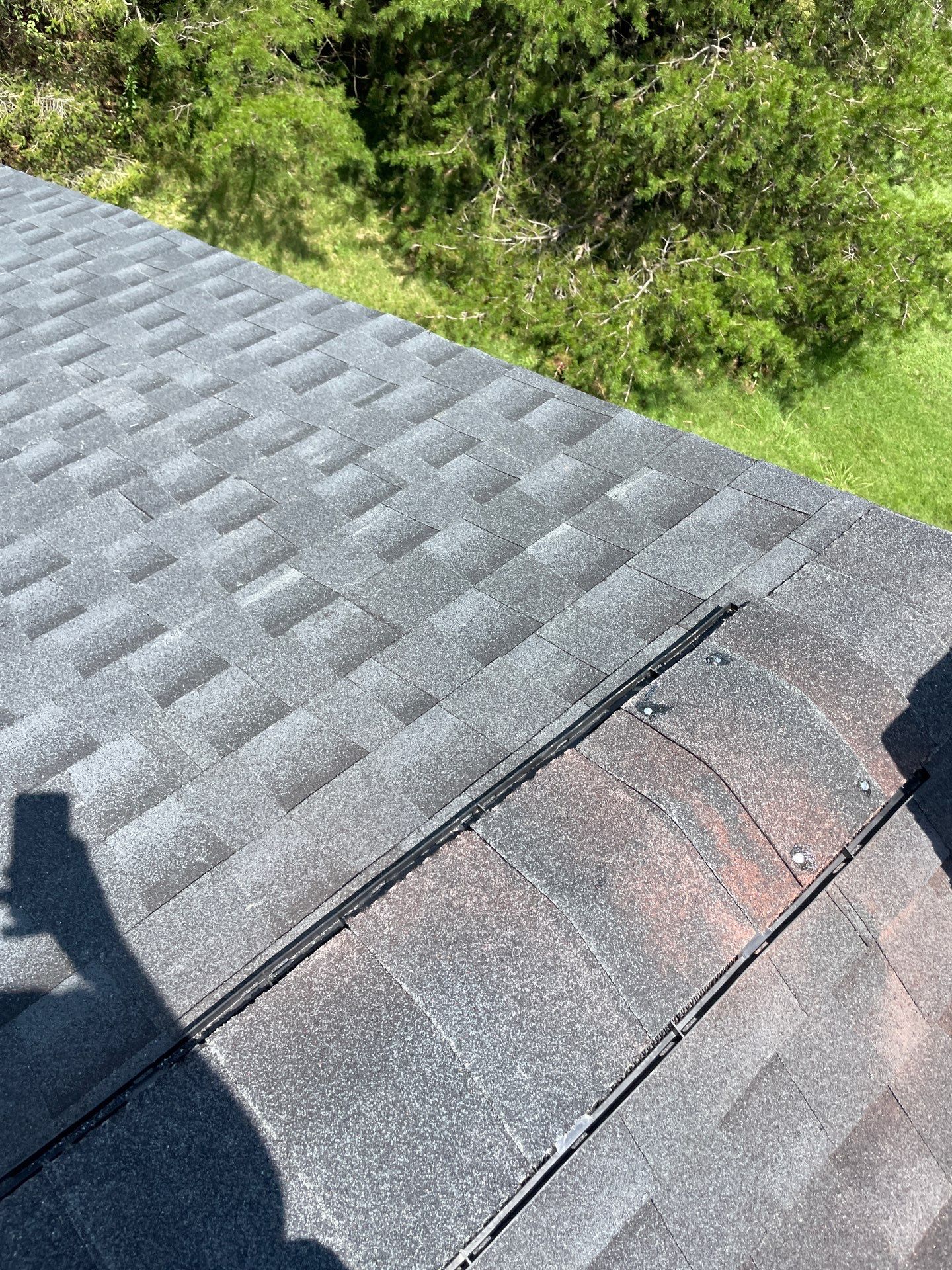 Residential Roofing Installation using GAF Timberline HDZ Charcoal by Rainstoppers Roofing