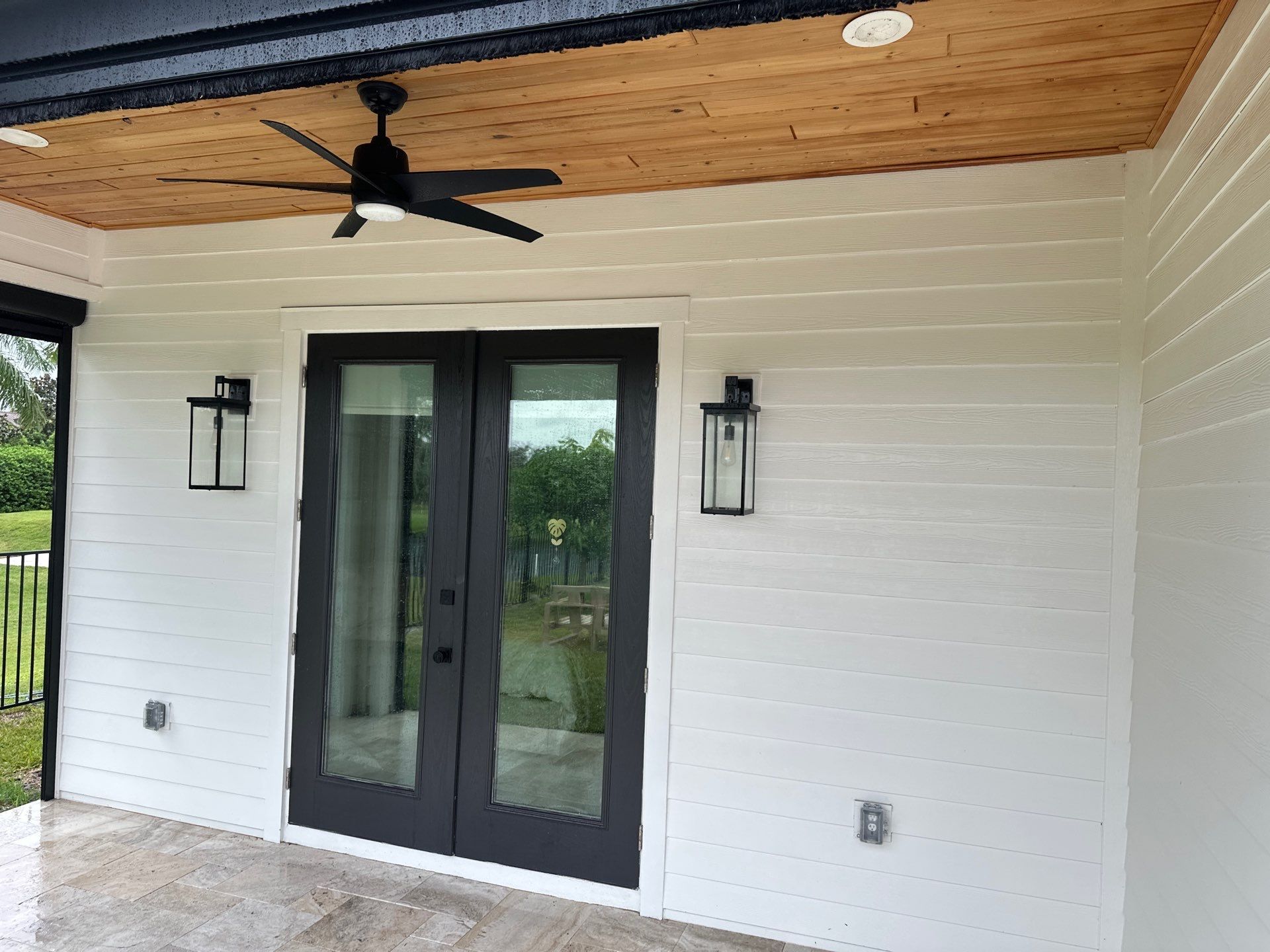 Complete Two-Story House Wash and Driveway Cleaning in Winding River Community, Bradenton, FL by Sunshine AquaWash