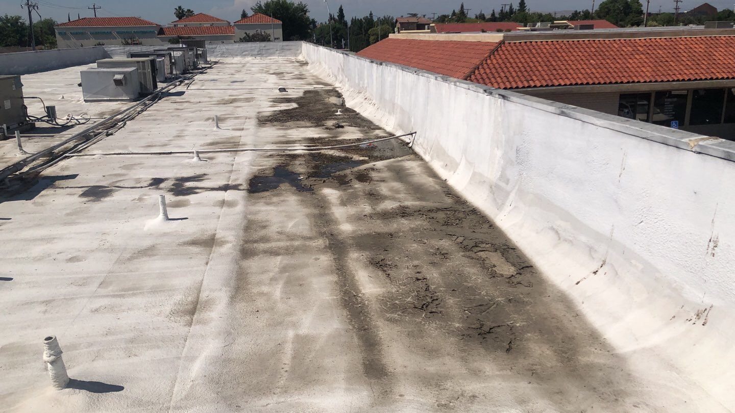 Reburbish existing spray foam job by Straight Edge Roofing Inc