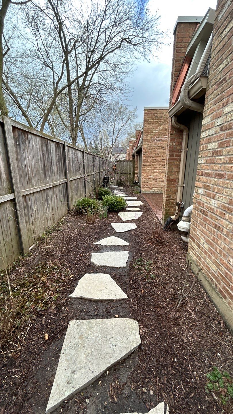 Flagstone stepper cleaning by Northern Power Washing LLC.