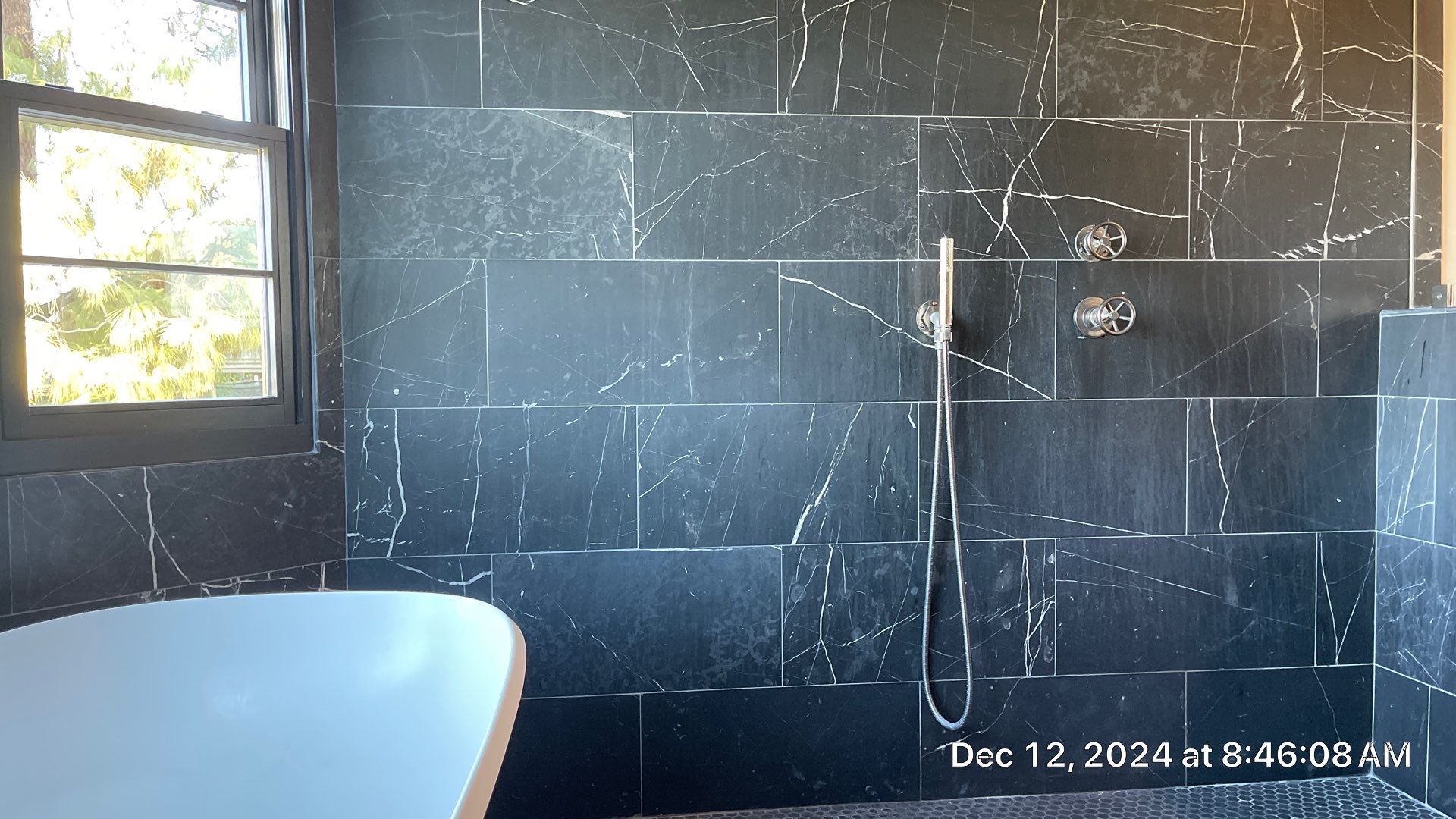 Marble shower restoration by The Beautiful Stone Company