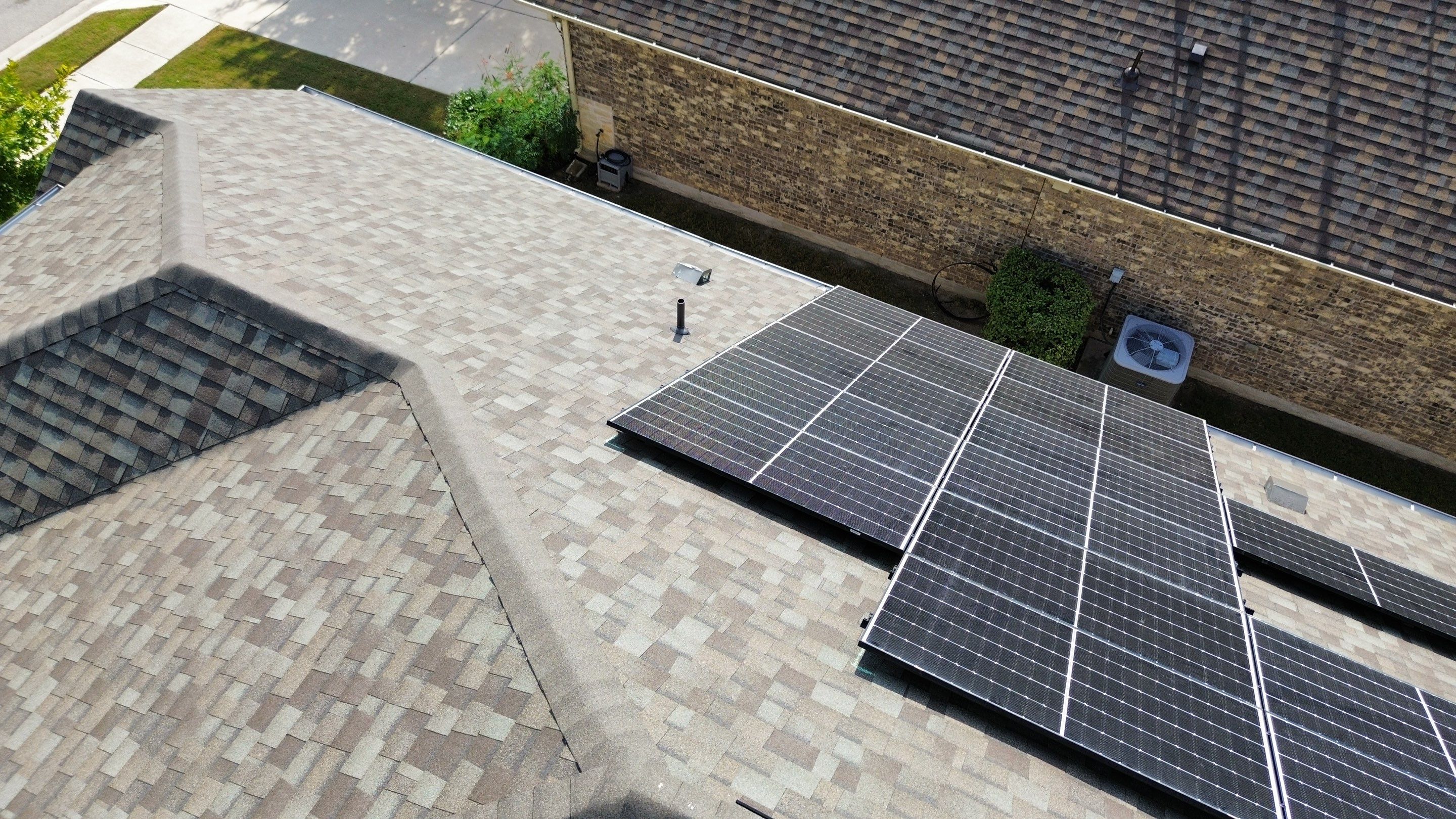 Full Roof Replacement with Solar Reinstall – Duration Driftwood | Round Rock, TX by Kstylez Roofing & Construction