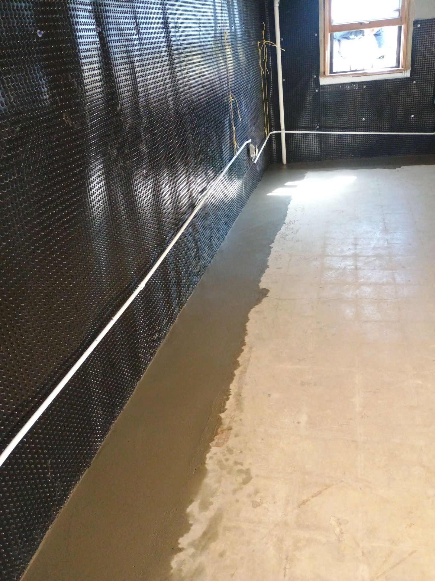 Interior Drain Tile & Foundation Crack Repair in St. Anthony, MN by Waterproofing Northeast