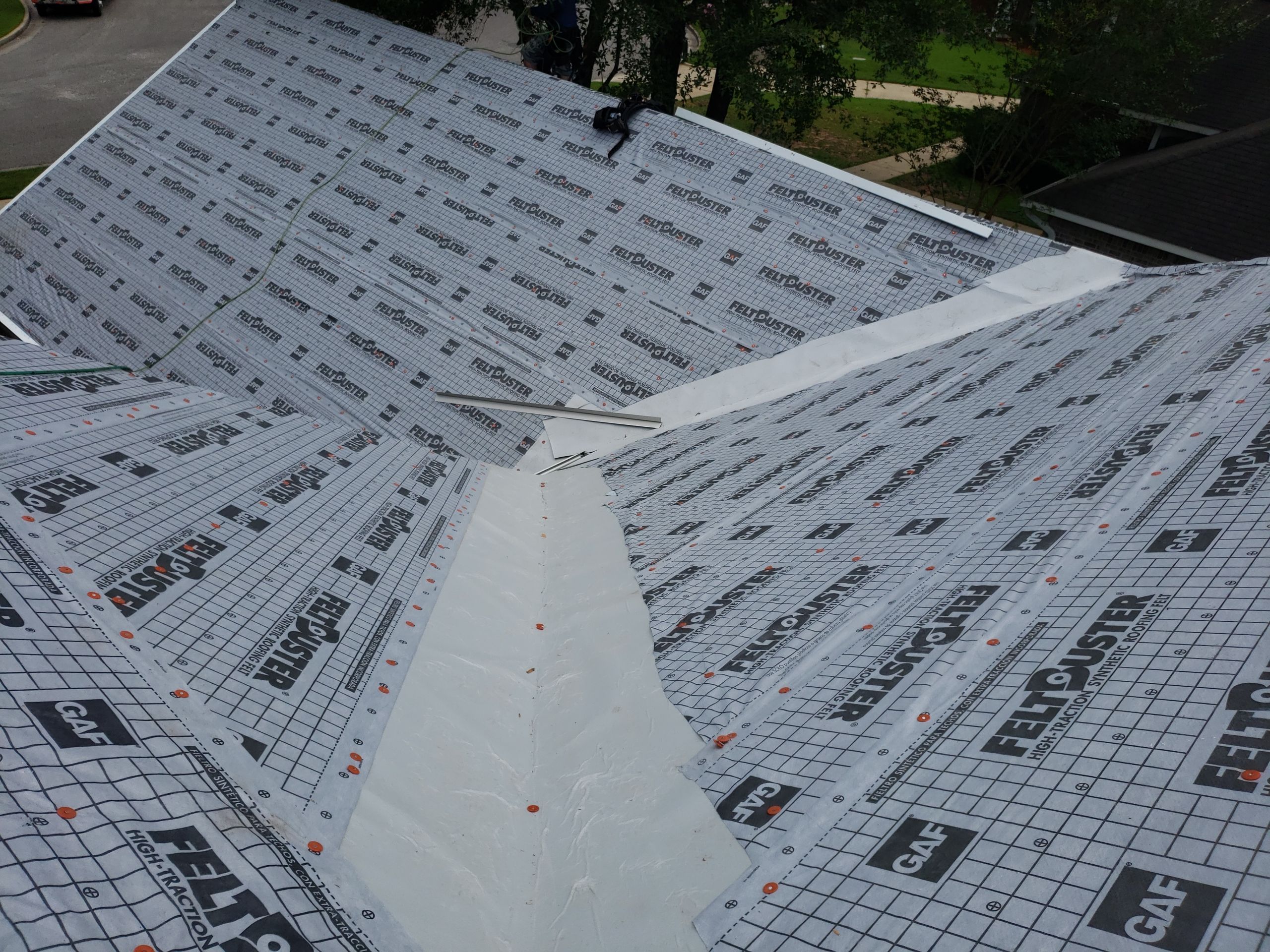 Residential Roofing Installation using Roof Replacement by American Roofing & Construction LLC