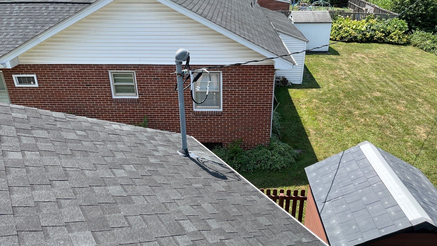 Residential Roofing Installation using Atlas Pinnacle Pristine Black Architectural Shingles by Frederick Roof Repair