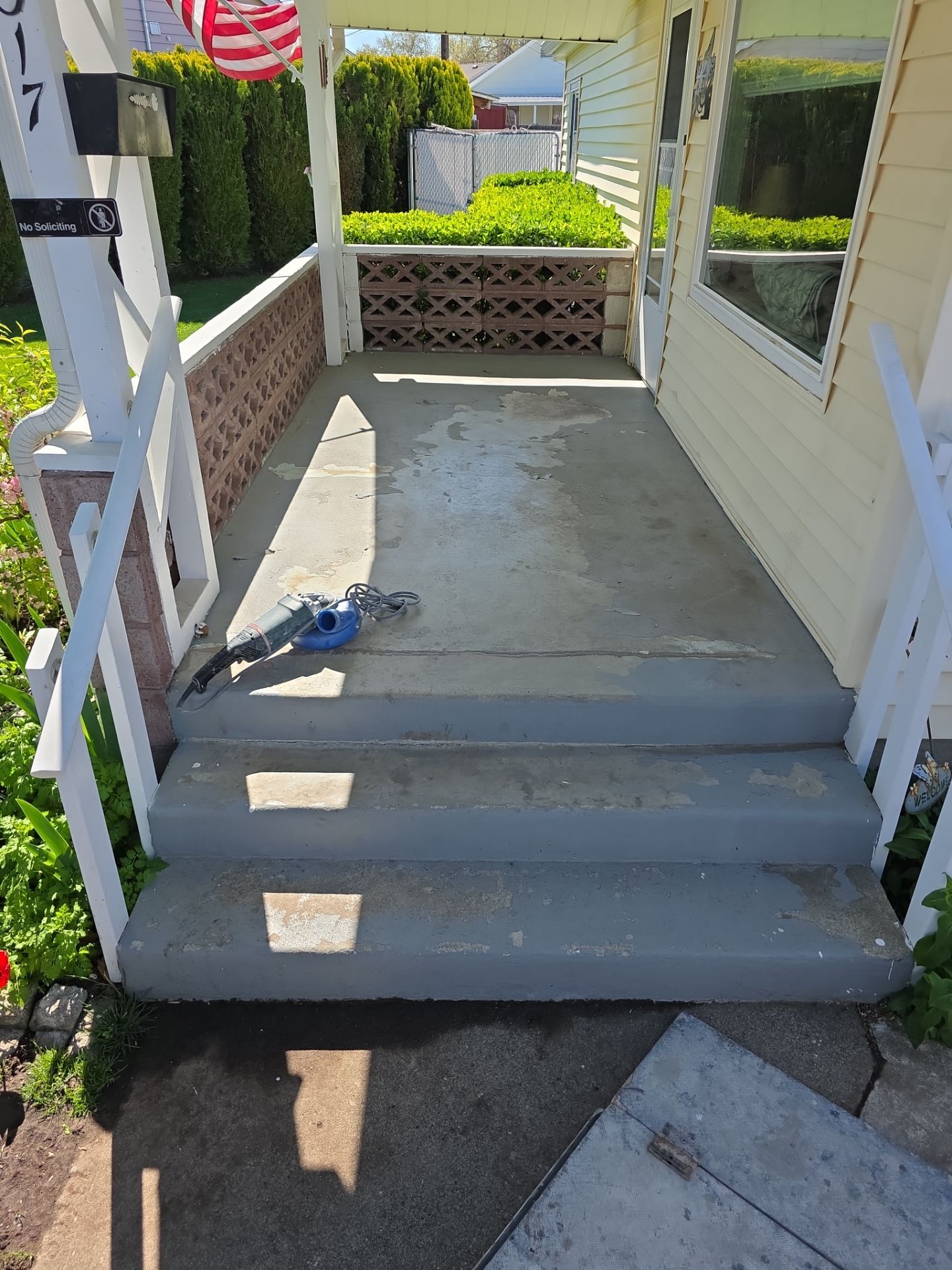 Limestone Hybrid Concrete Porch and Step Transformation in Richland by Croc Coatings, LLC