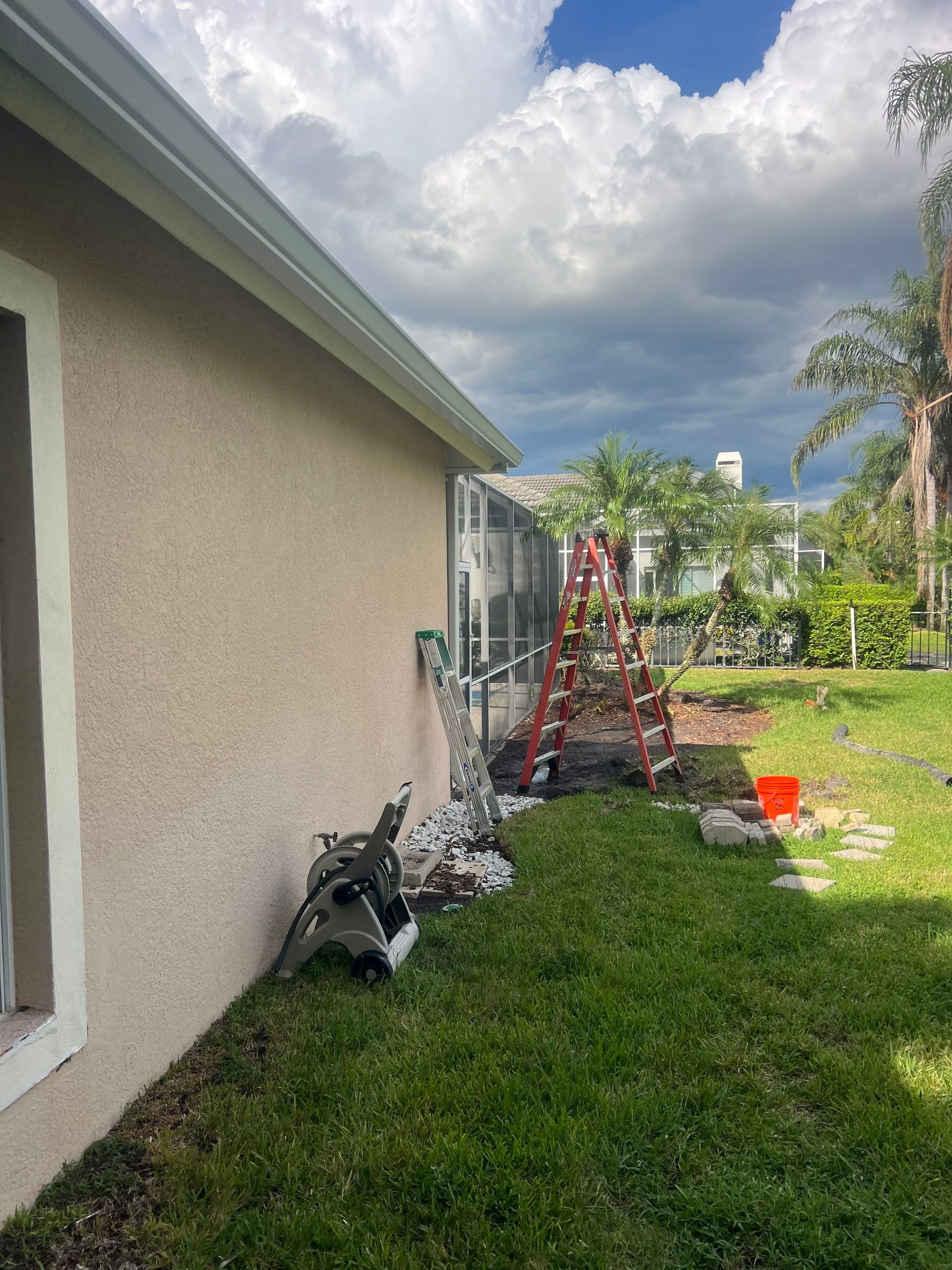 White Gutters and White Downspouts by Gutter Professors