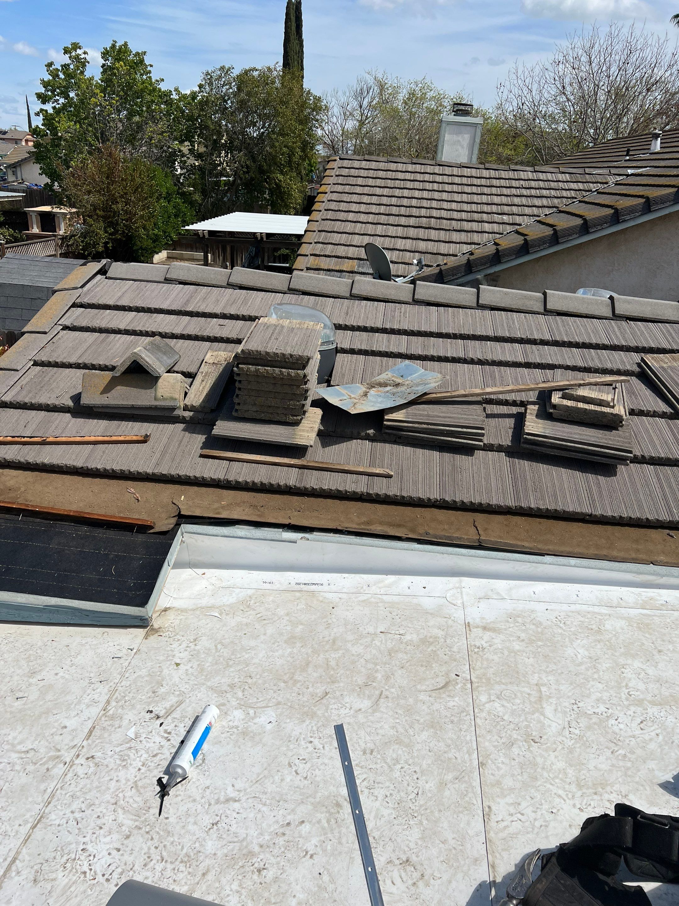 Single-ply roofing system on porch using TPO 60 mil by Straight Edge Roofing Inc