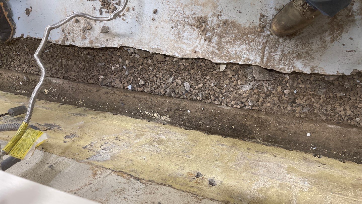 Interior Waterproofing Using GrateDrain™ Products by Toledo Basement Repair 