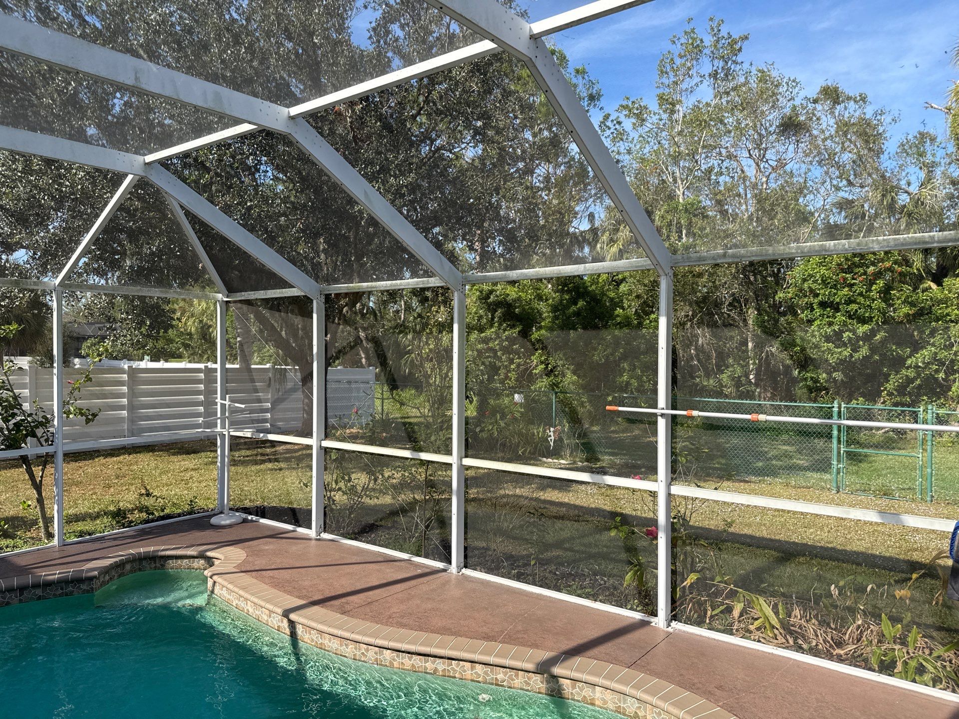 Driveway, Sidewalk, Street Curbing & Pool Screen Enclosure Cleaning in Regency Oaks, Palmetto, FL | Sunshine AquaWash by Sunshine AquaWash
