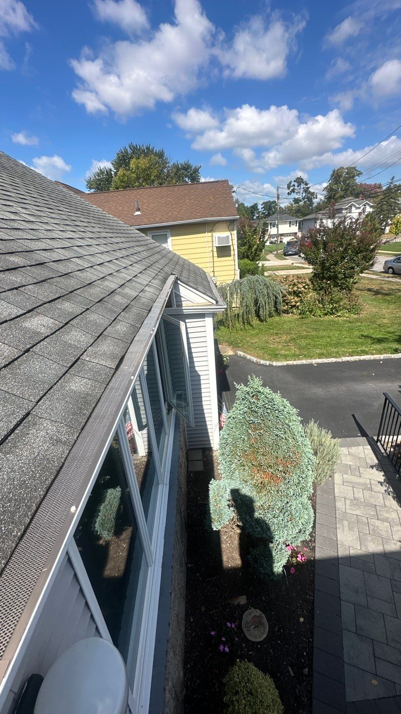 Cleaning and Microguard Installation. by Above All Gutters 
