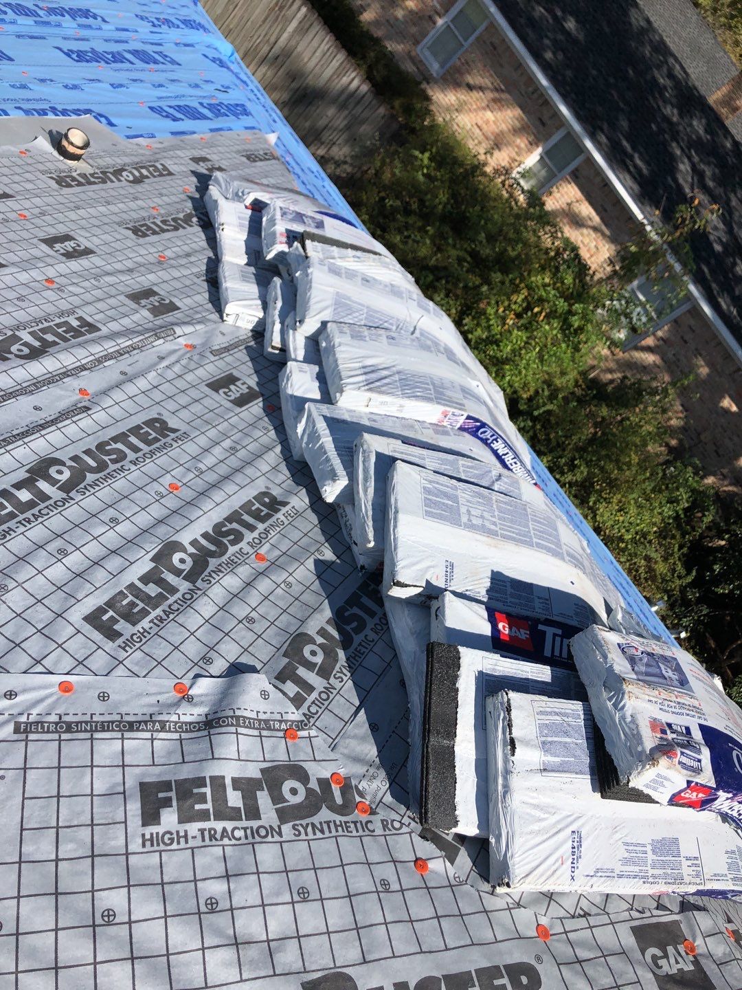 Residential Roofing Installation using Roof Replacement by American Roofing & Construction LLC