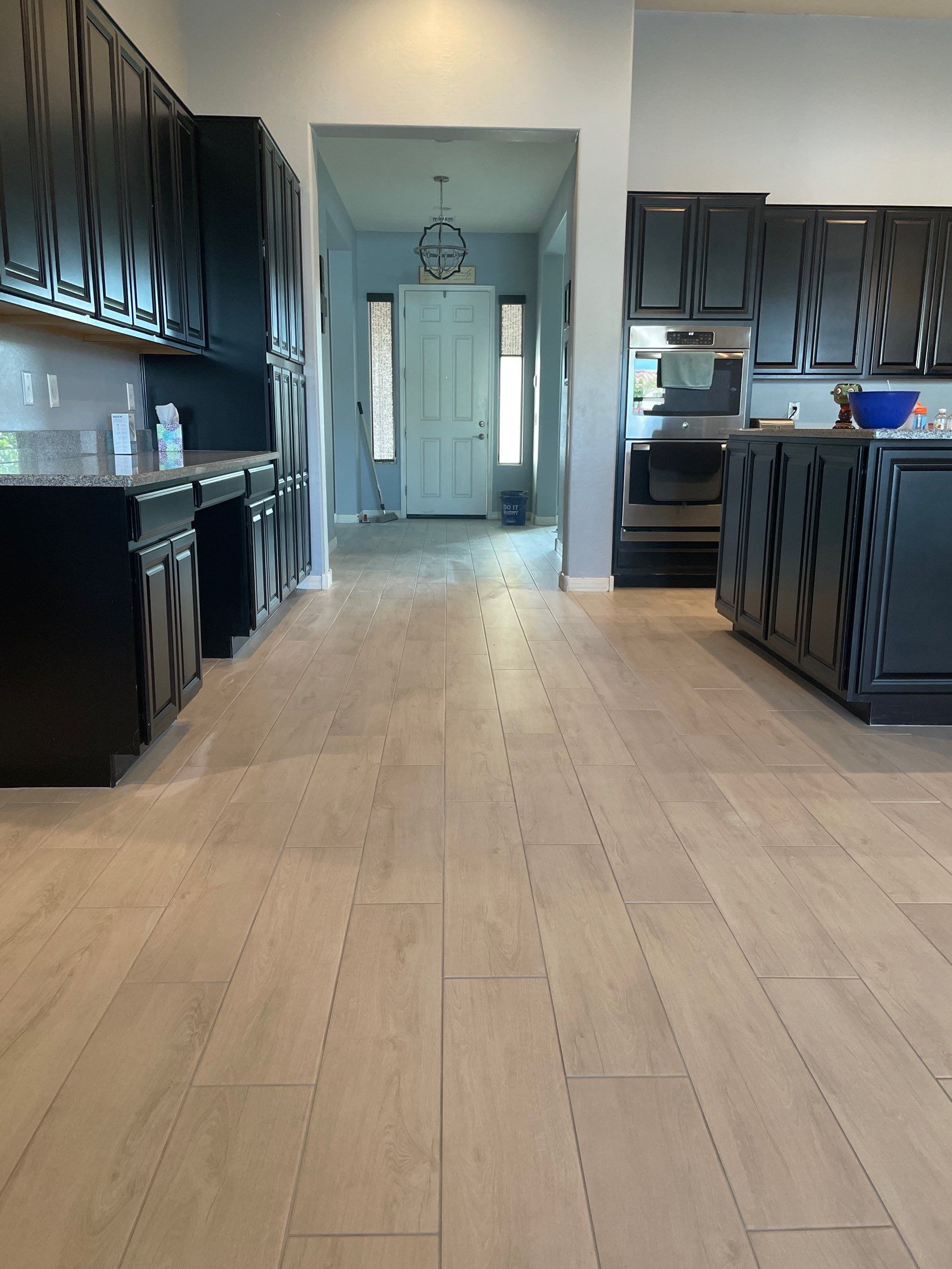 Wood Look Tile Floors and an Extra Large Shower  by Footprints Floors of Chandler 