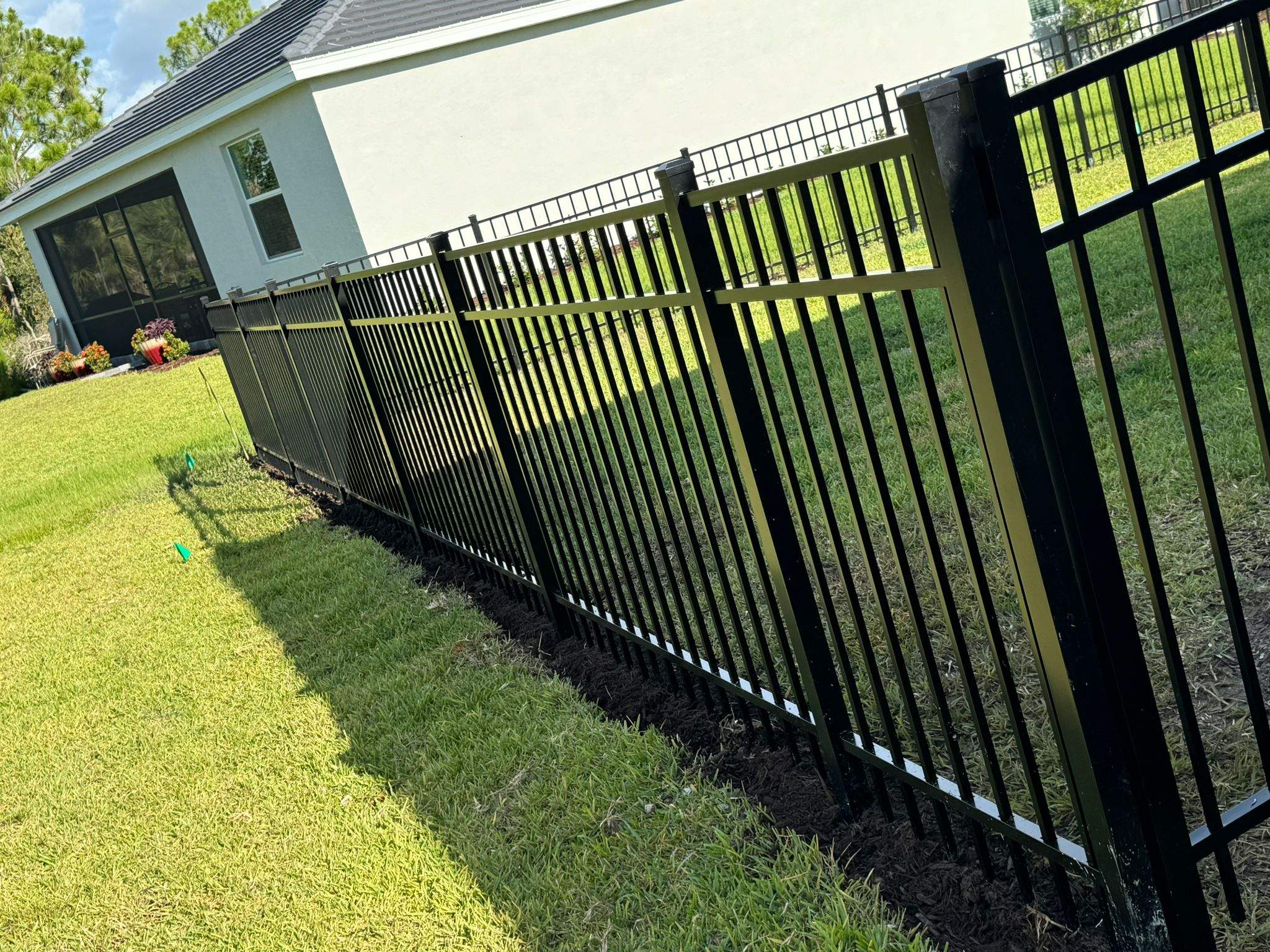 Black Aluminum Picket Fence Installation in Venice, Florida by True Fence LLC
