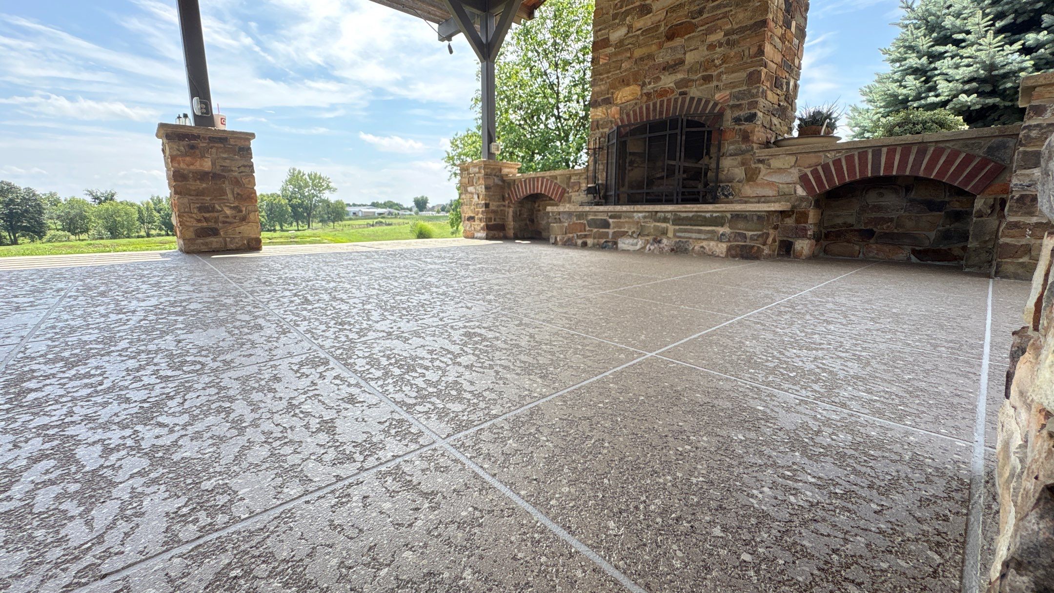 Custom Back Patio Resurface - Kearney, MO by Big Red Decorative Concrete, LLC