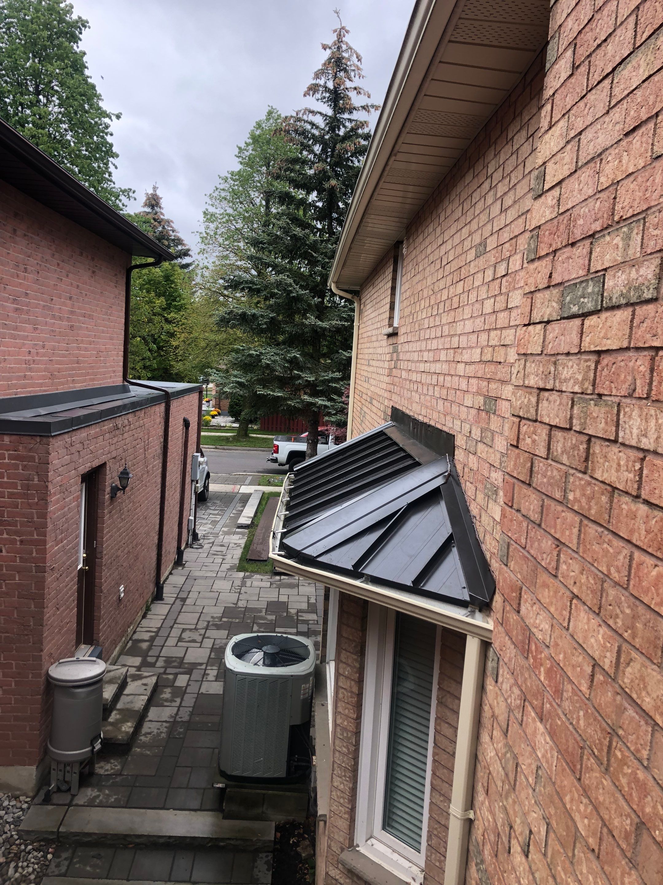 Residential Roofing Installation using 16" Standing Seam Panels by Jay Carter Roofing & Sheet Metal
