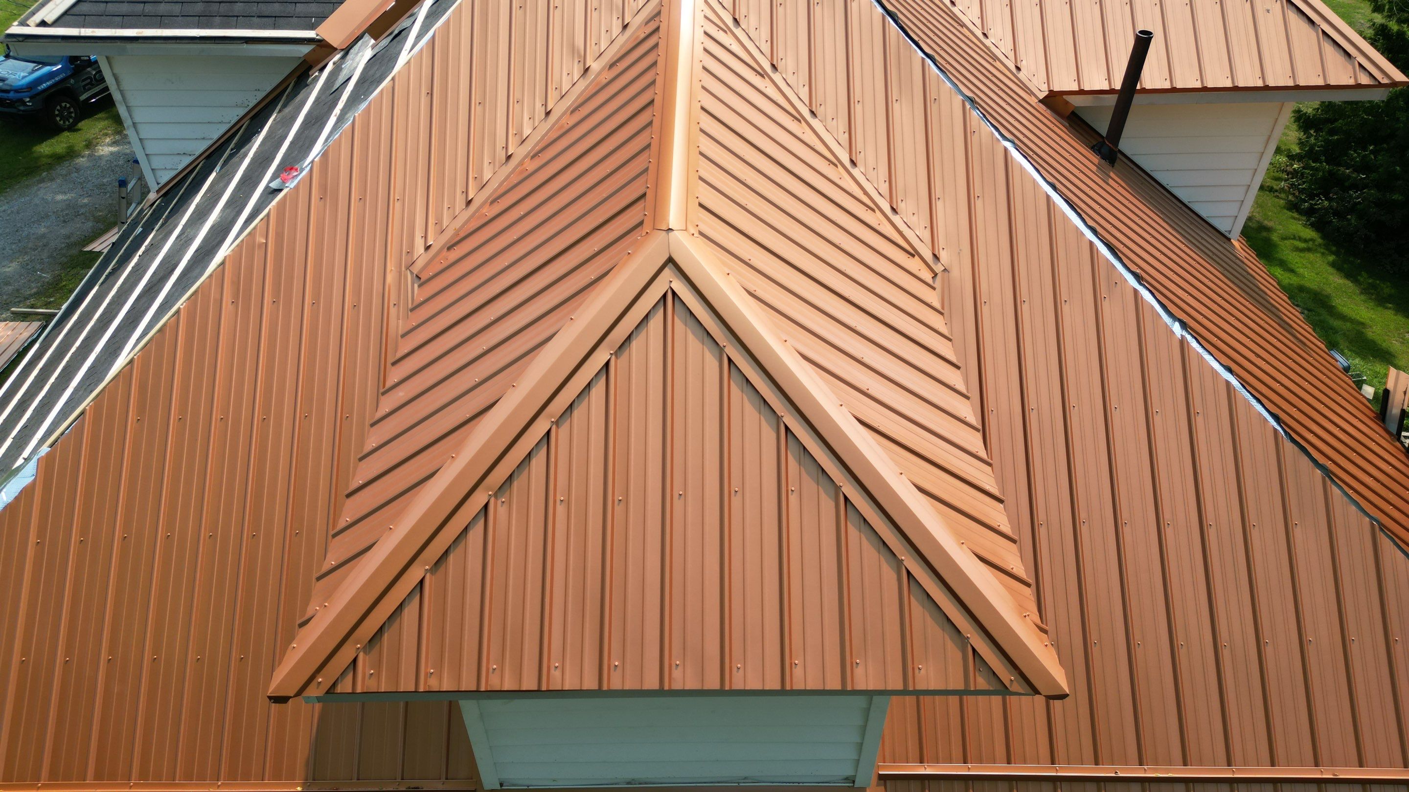 Residential Roofing Installation using Performance Panel Metal - Copper Metallic by RoofX 