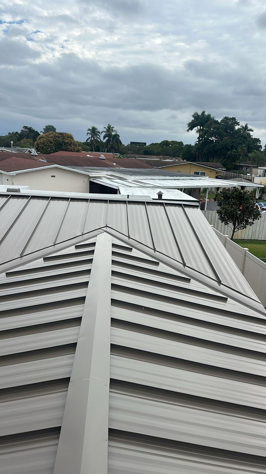Residential Roofing Installation using Metal Roof  by City Roofing Inc