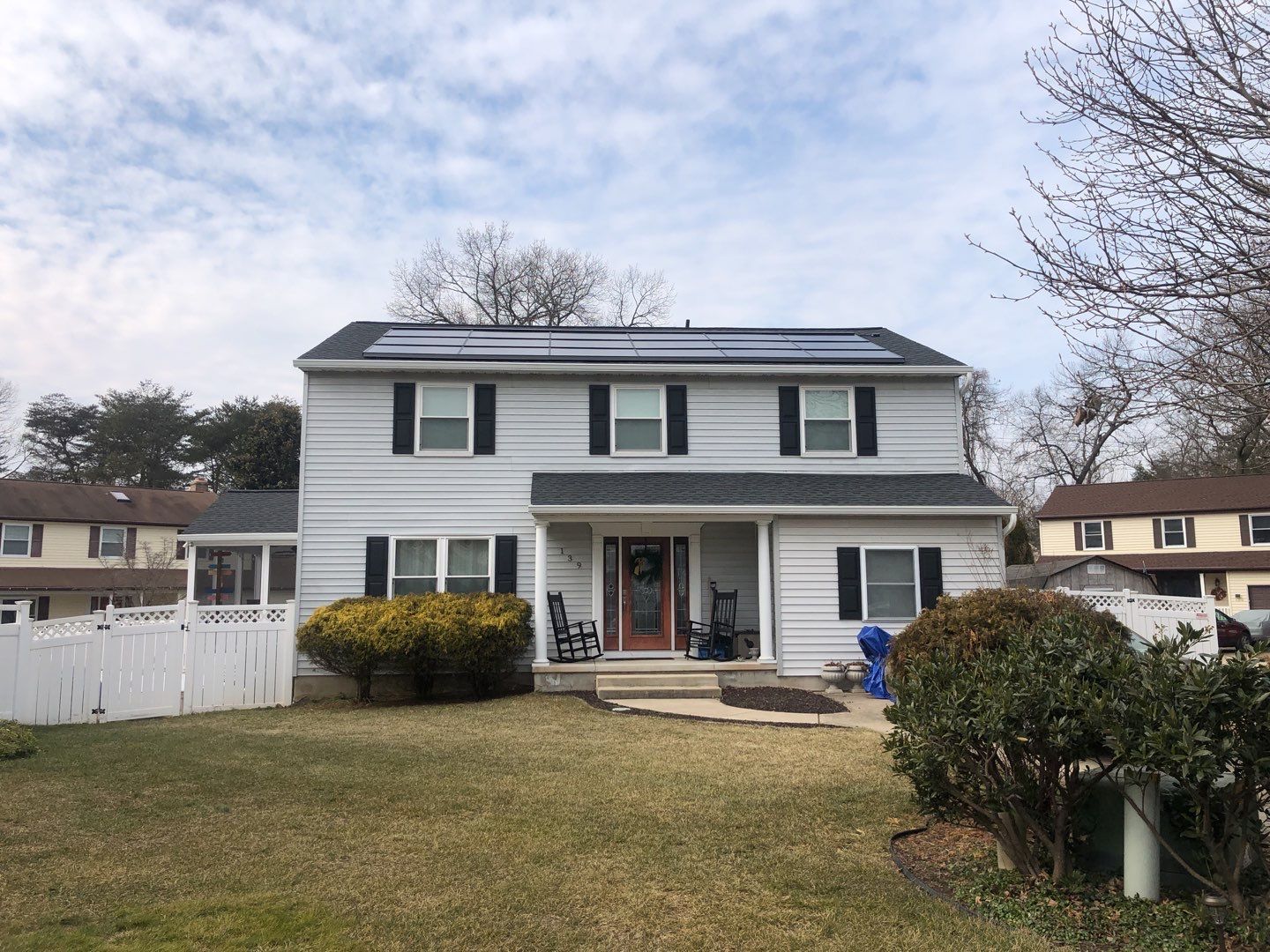 Roof Replacement with GAF Decotech integrated solar panels by American Home Contractors