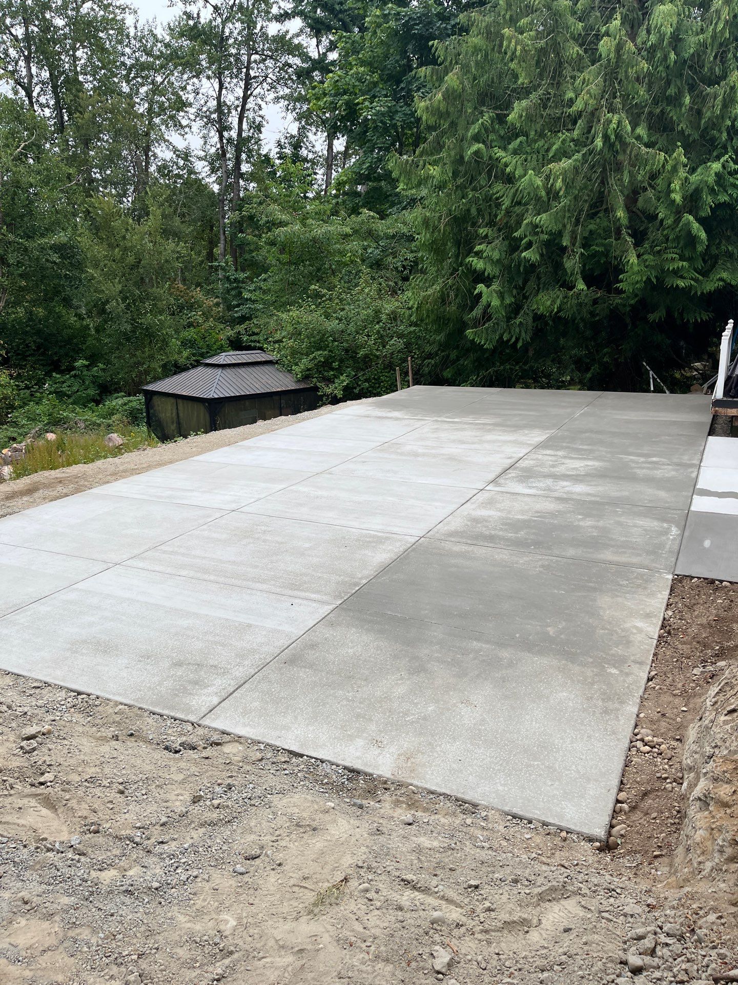 Concrete Back Patio Makeover  by Jireh Asphalt & Concrete Inc 