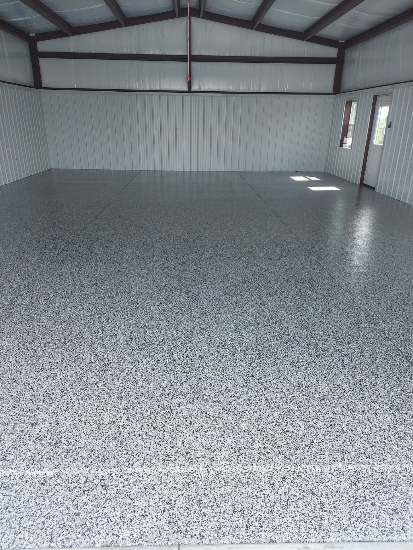 Garage Floor Coating with Domino by Copperhead Coatings