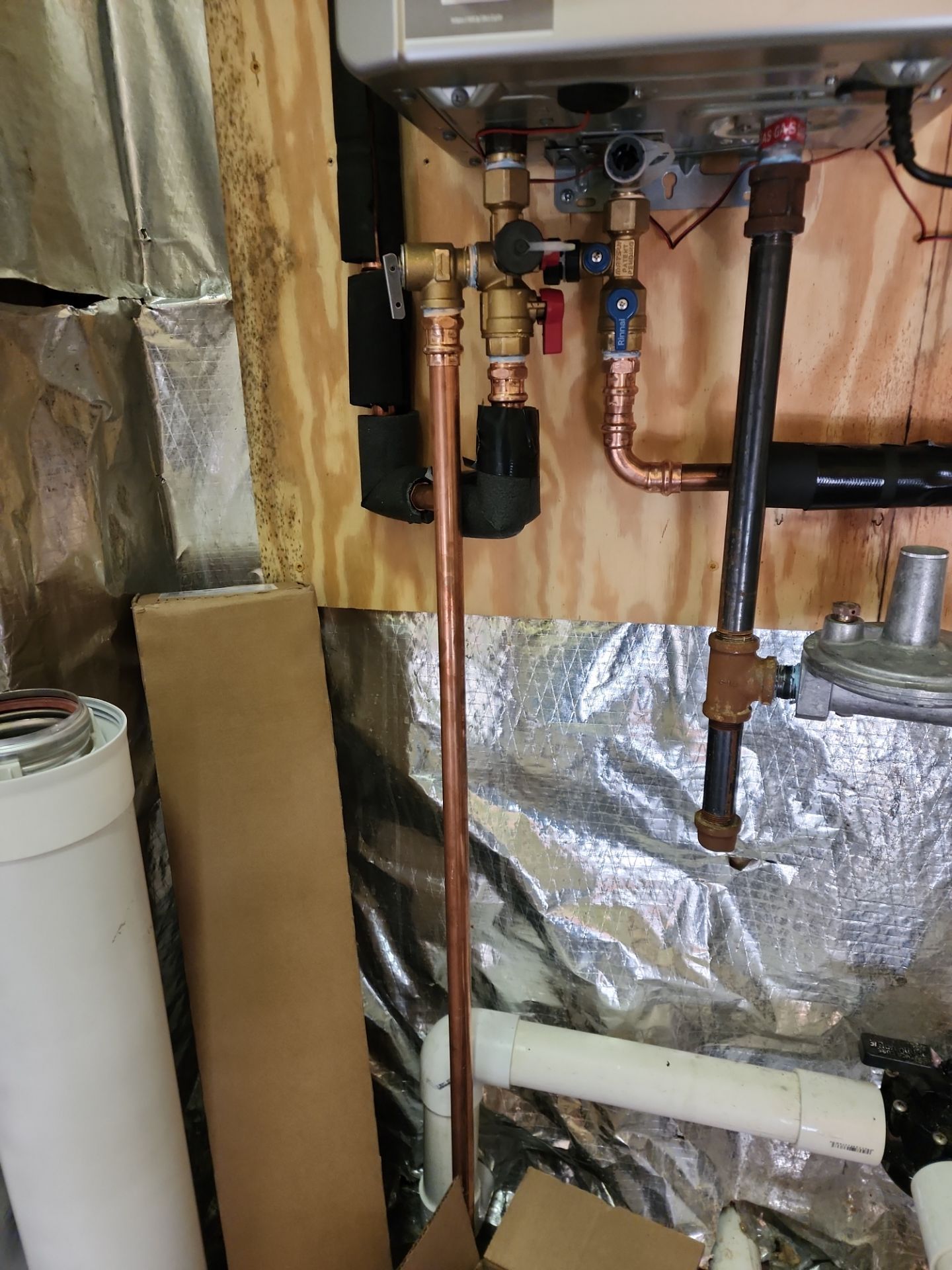 Tankless Hot Water Heater by Elemental Heating and air conditioning LLC