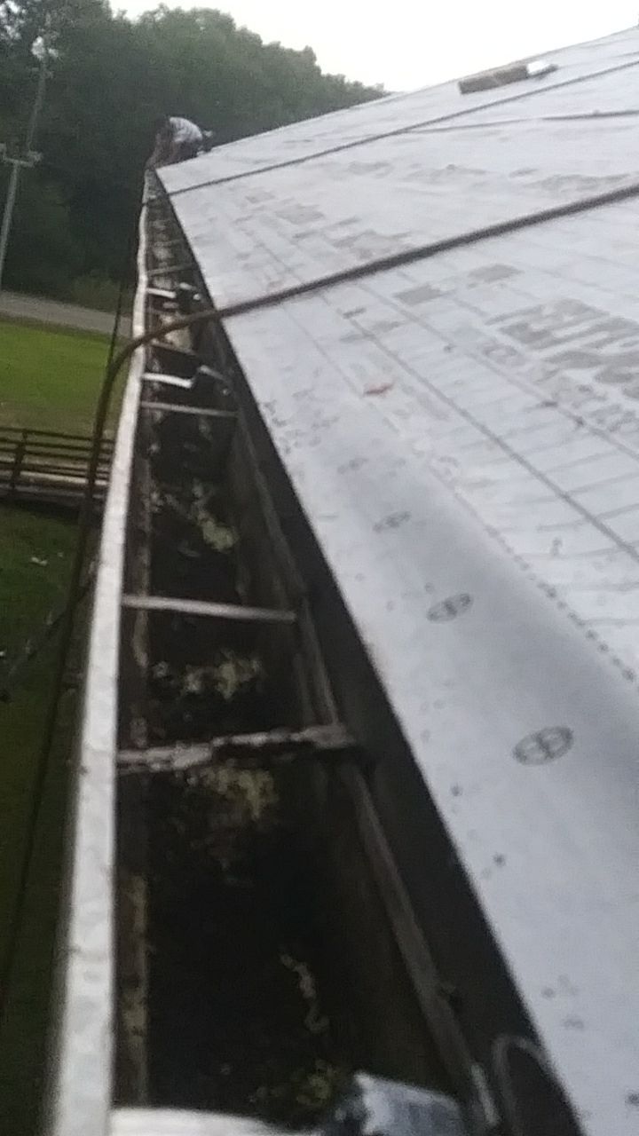 Residential Roofing Installation using Roof Replacement by American Roofing & Construction LLC