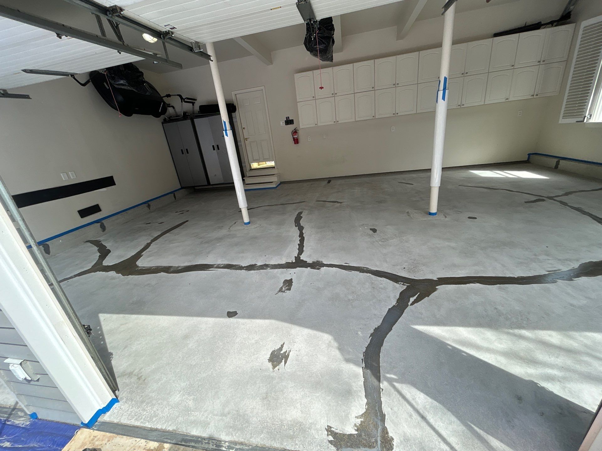 Concrete Floor Coating Transformation by DiGiorgi Roofing and Siding Inc
