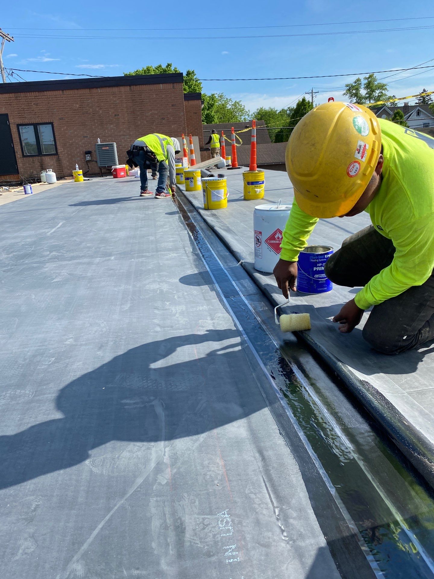 Commercial Roofing Installation using 60 mil rubber roof  by Nitro Roofing and Construction