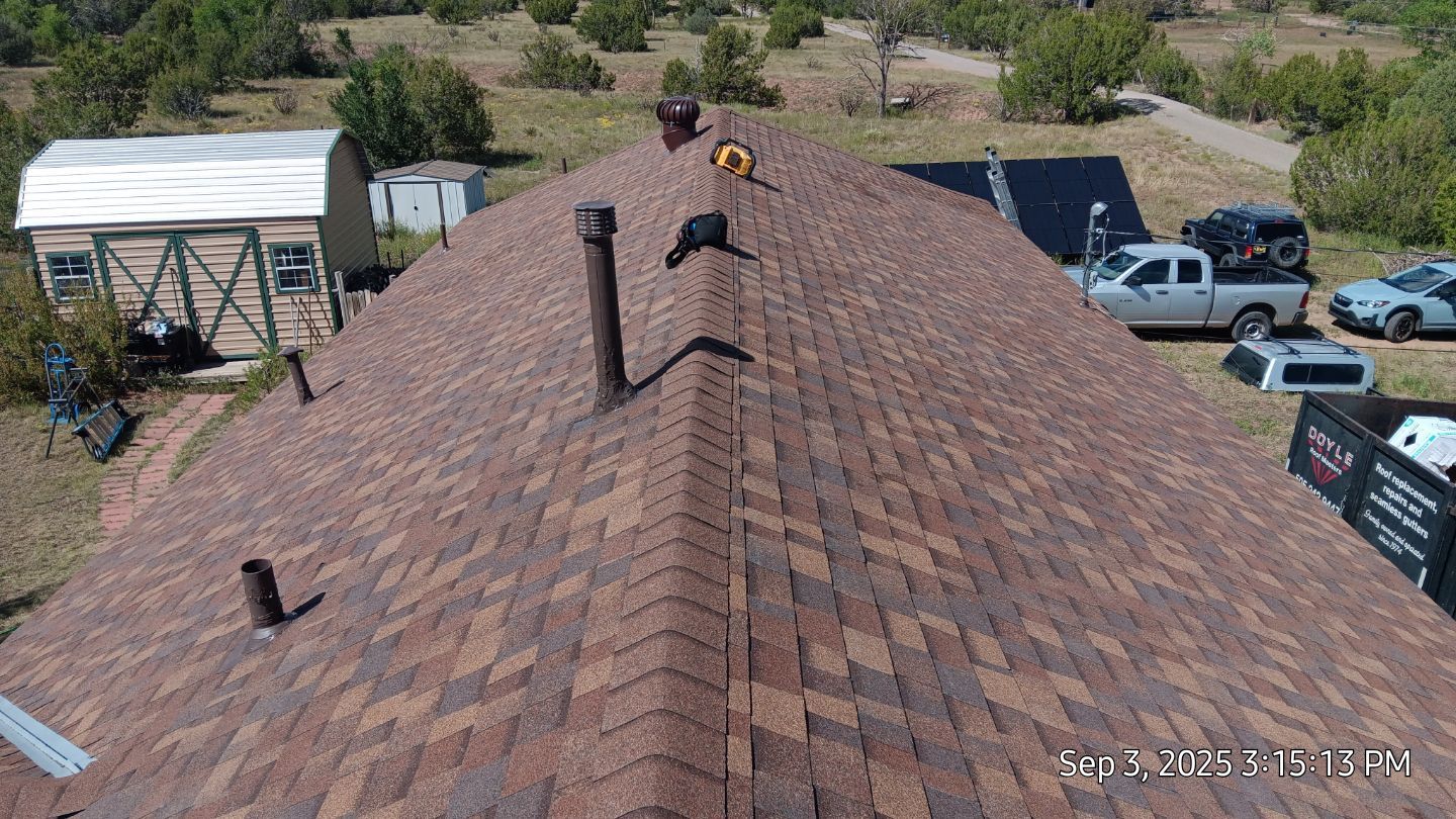 Owens Corning Desert Rose duration shingle roof replacement in Sandia Park by Doyle Roof Masters Inc
