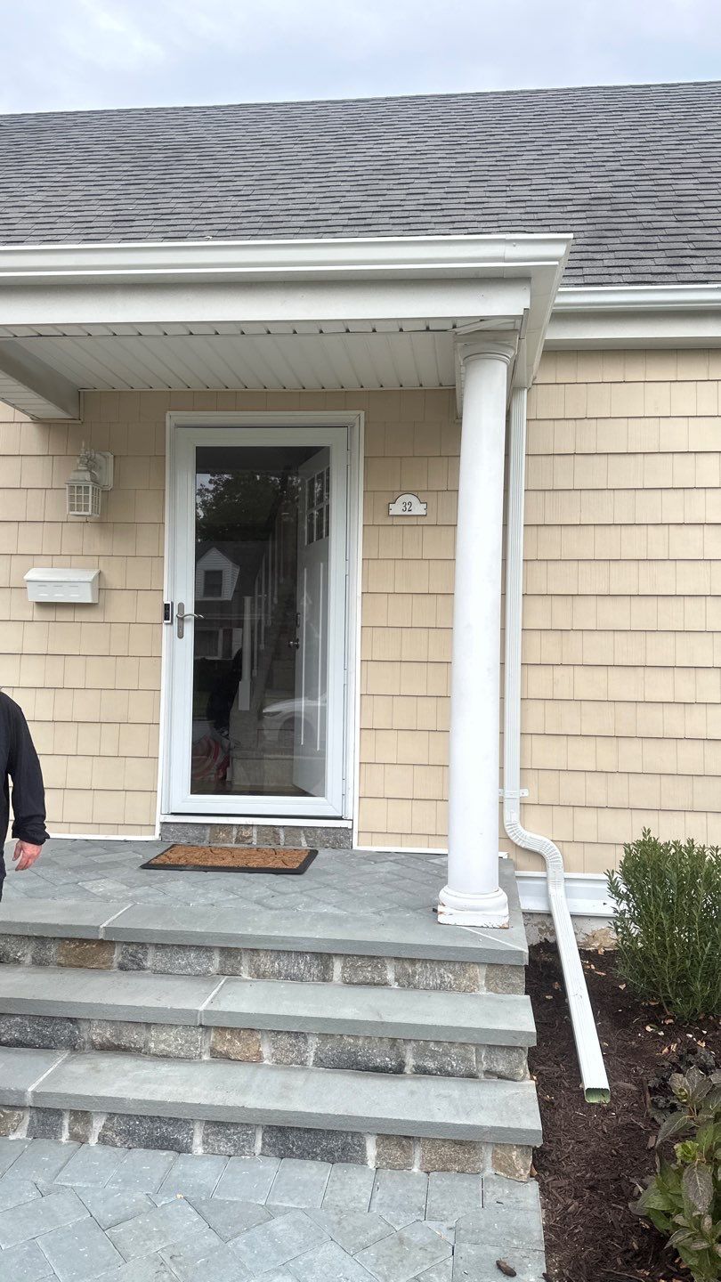 Gutter Installation using 5"white K style seamless gutters and 2x3 white leaders by Above All Gutters 