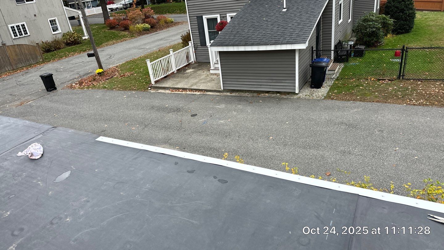 Westford EPDM Flat Roof with Gutter & Soffit/Fascia Replacement by Mighty Dog Roofing of Greater Middlesex County