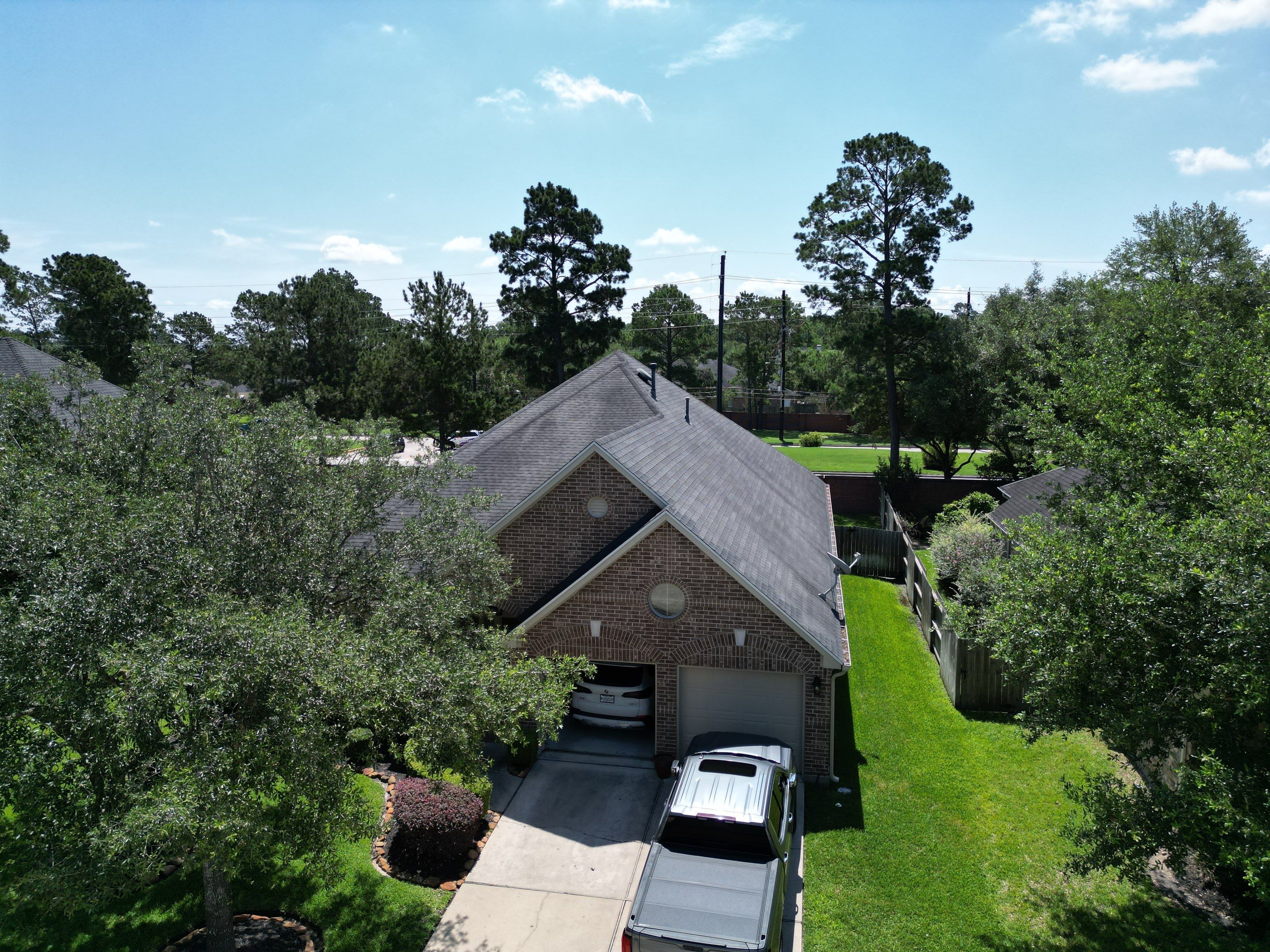 OC Duration Onyx Black by HHH Roofing & Construction