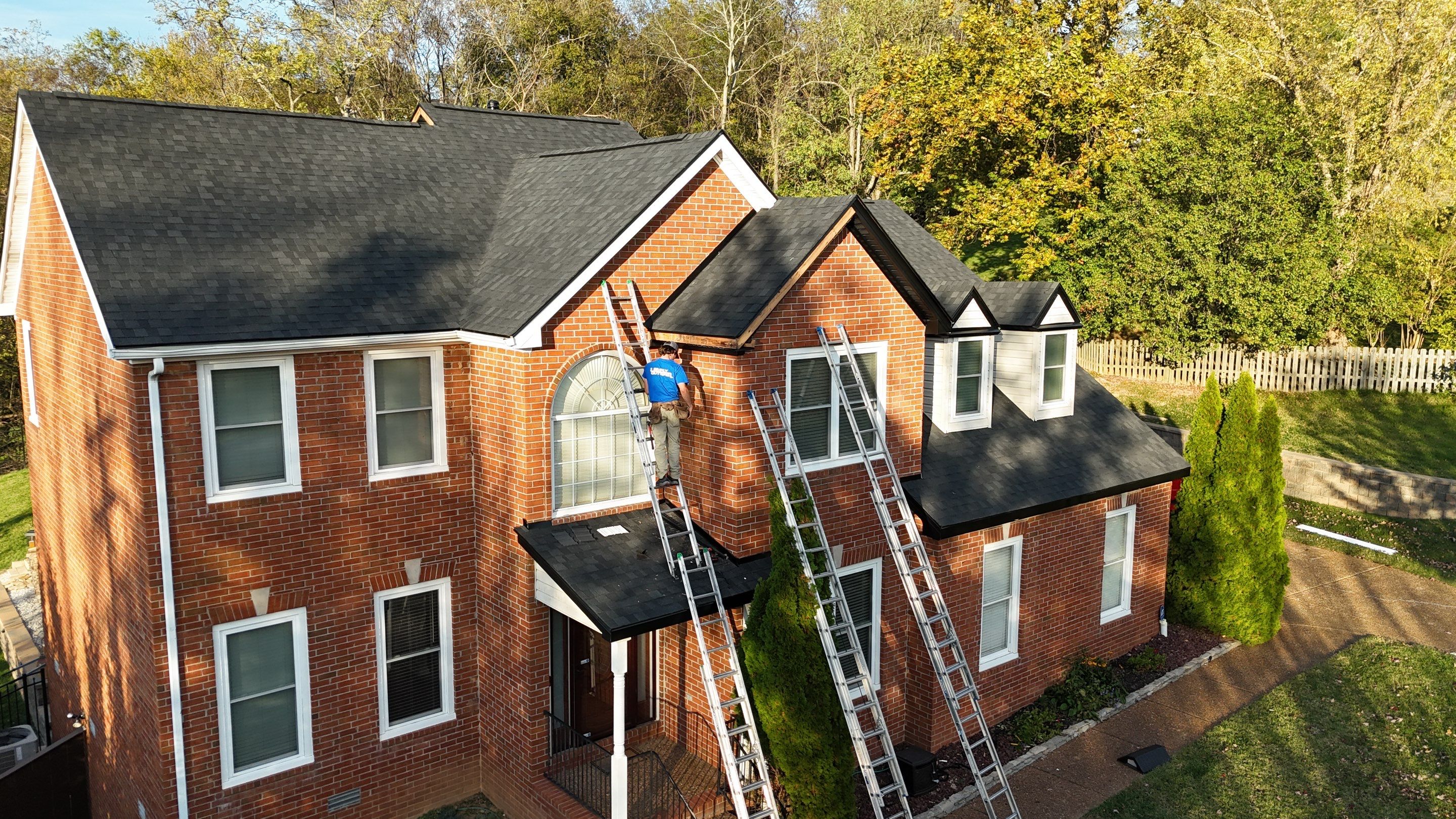 Charcoal Black Re-Roof & Gutters by Royal House LLC
