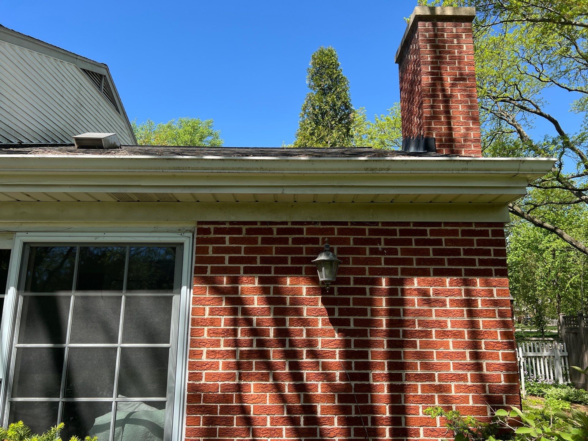 Housewashing  using Algaecide, soft wash soap by Northern Power Washing LLC.