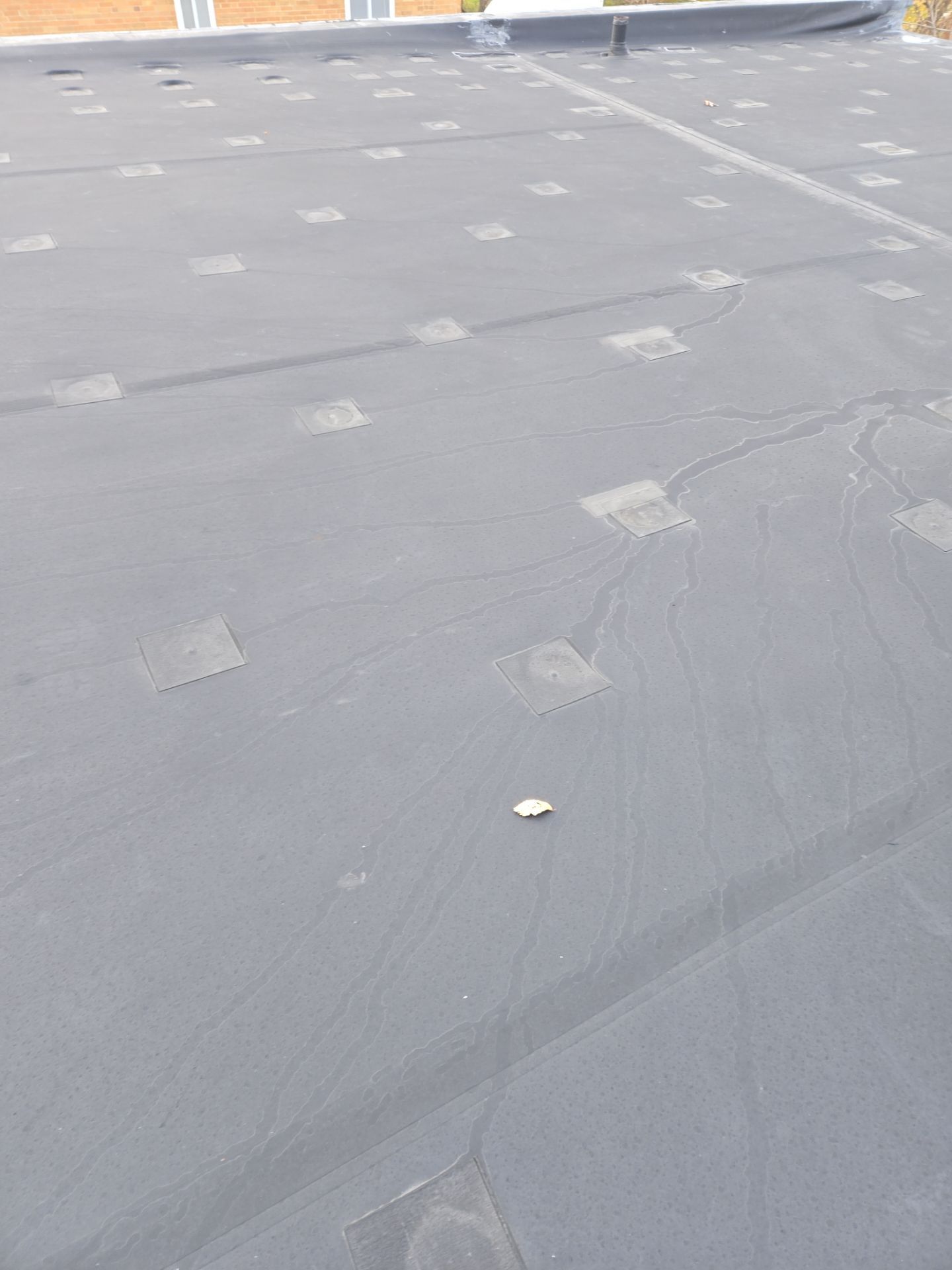 Commercial Roofing Installation using Duro-Last 50 mil PVC by 3 Daughters Construction 