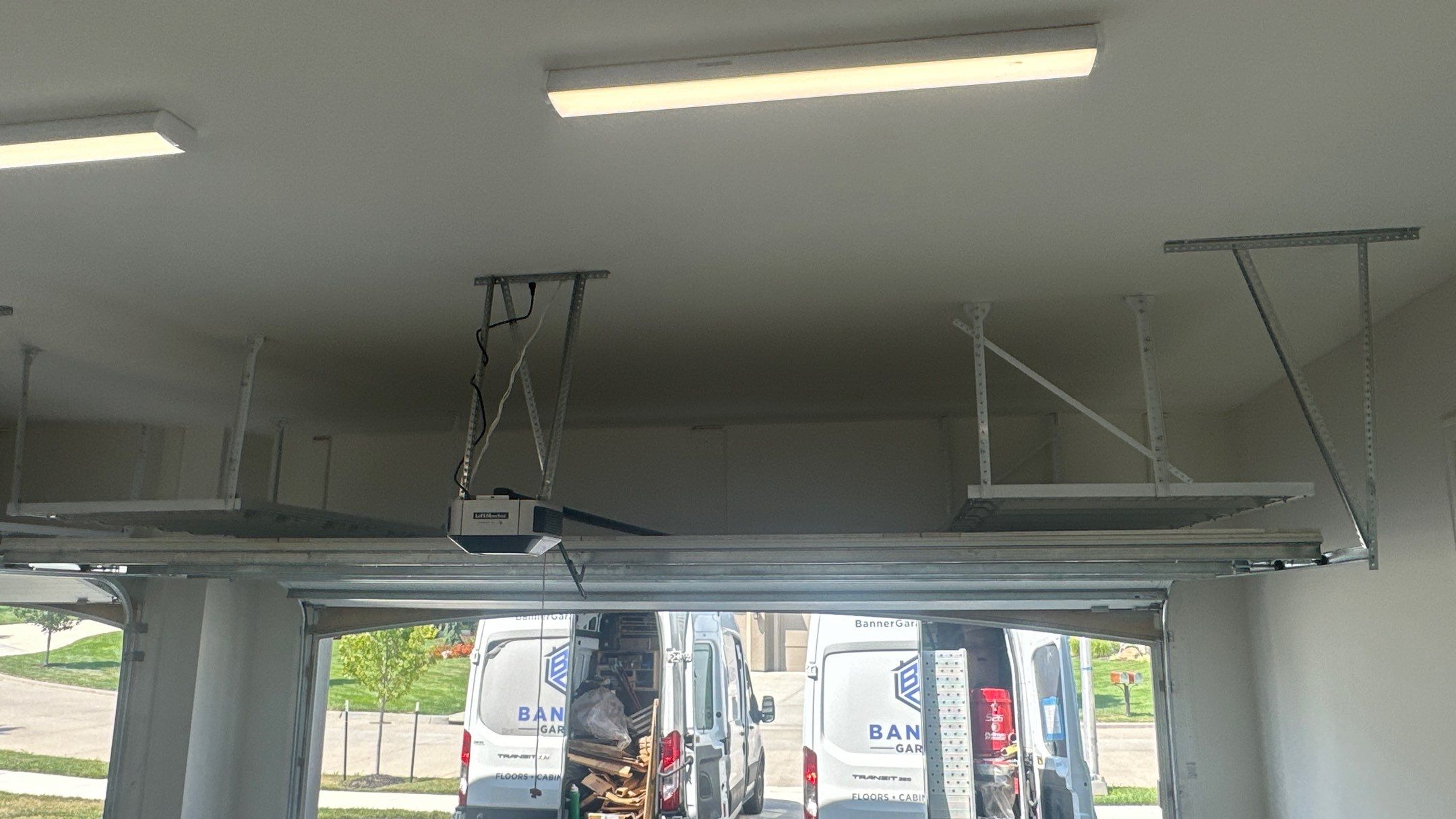 New bike storage for Jason E. along with some overhead racks  by Banner Garage