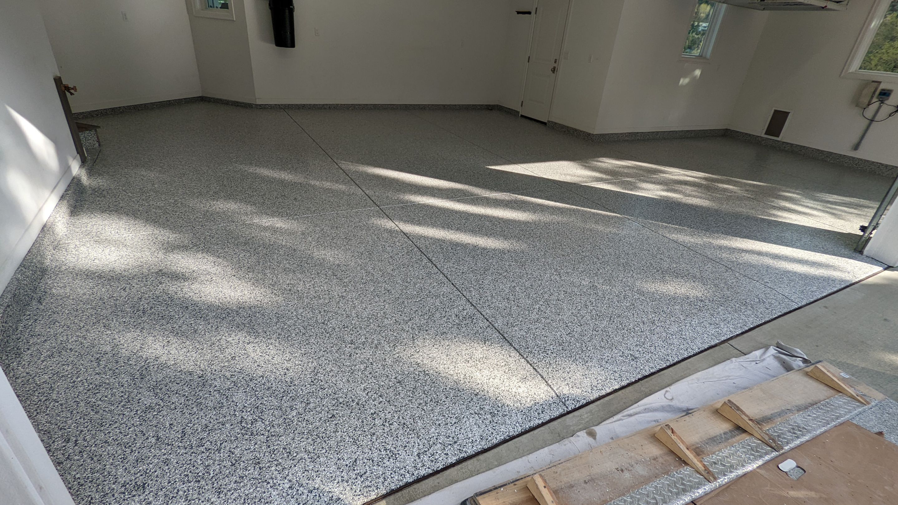 Garage Transformation using Slate Stone by Croc Coatings, LLC