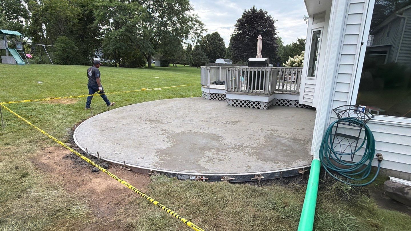 Penfield Oxford Slate Patio by NG Masonry & Construction LLC
