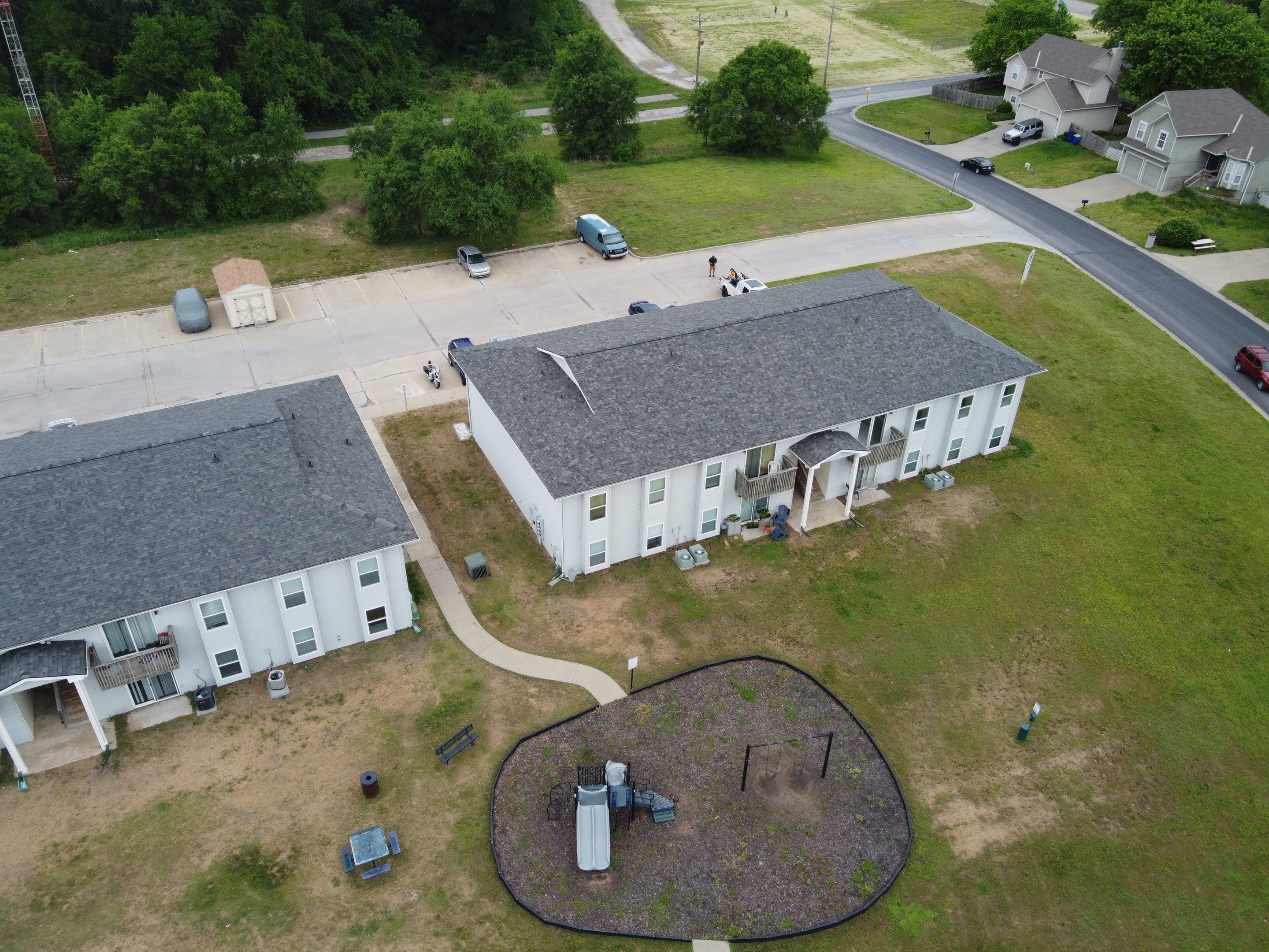 Multifamliy Complex ROOF REPLACEMNT with Ventilation Upgrades using Malarkey Vista Class III IR Shingles by Gorilla Exteriors Contracting, LLC