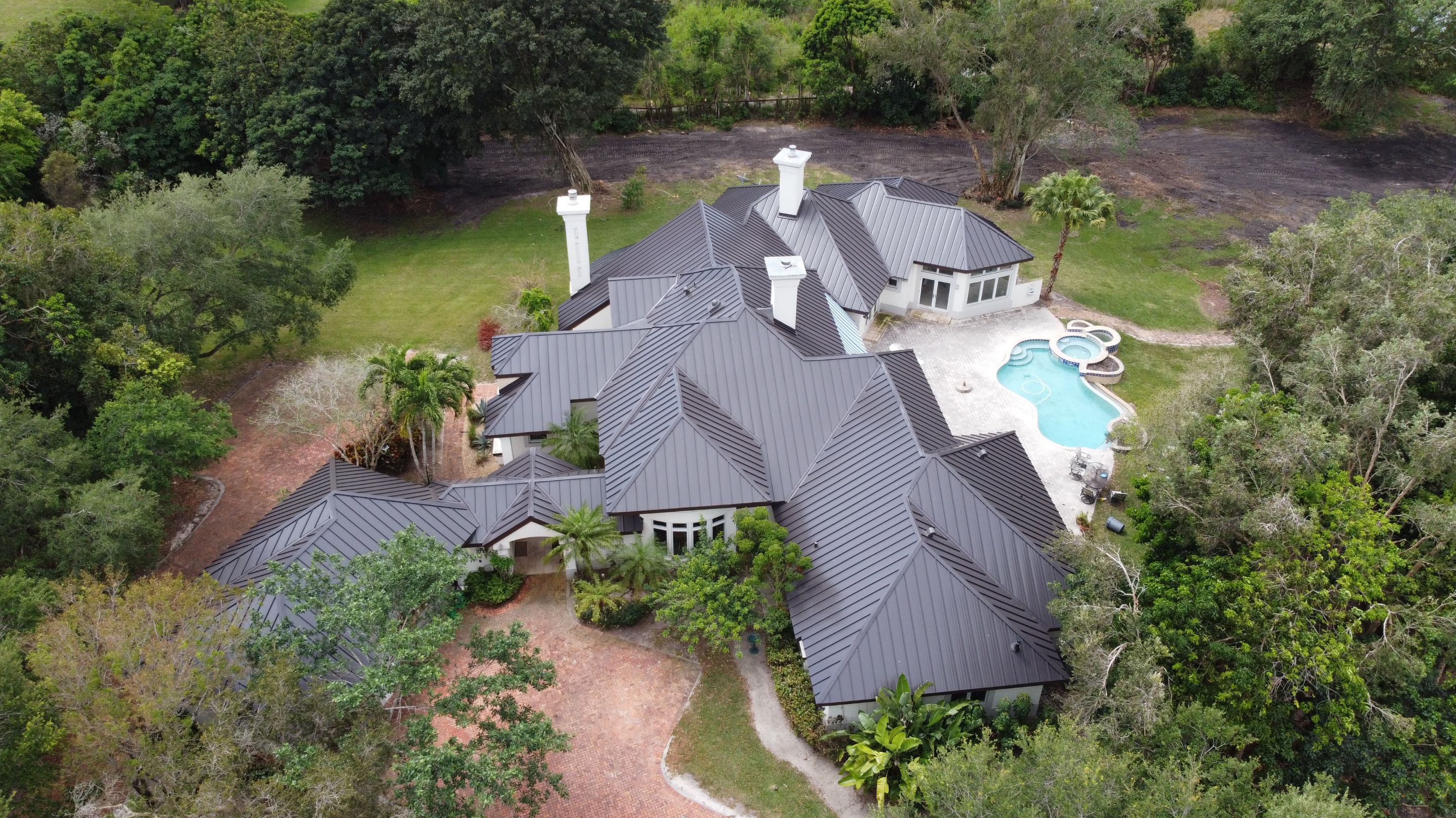 Residential Roofing Installation using 1" Nail strip metal roof by BLUES BROTHERS ROOFING