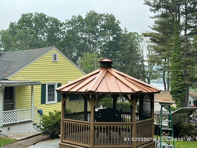 Residential Roofing Installation using Copper Penny Metal Roof